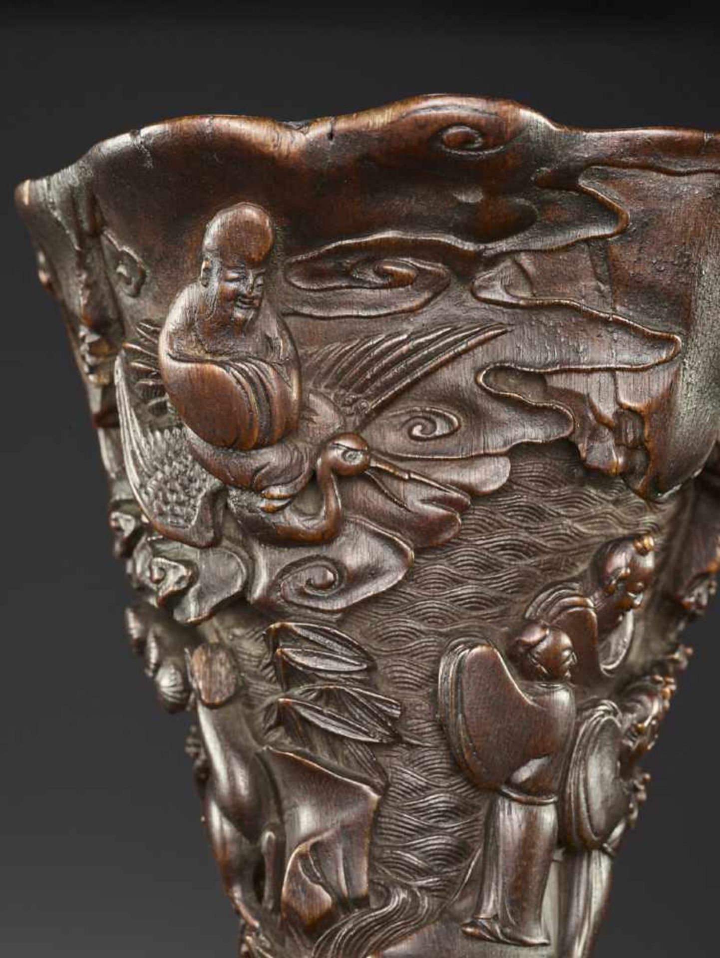 A LARGE RHINOCEROS HORN LIBATION CUP China, 17th – early 18th century. Finely carved in high - Image 2 of 17