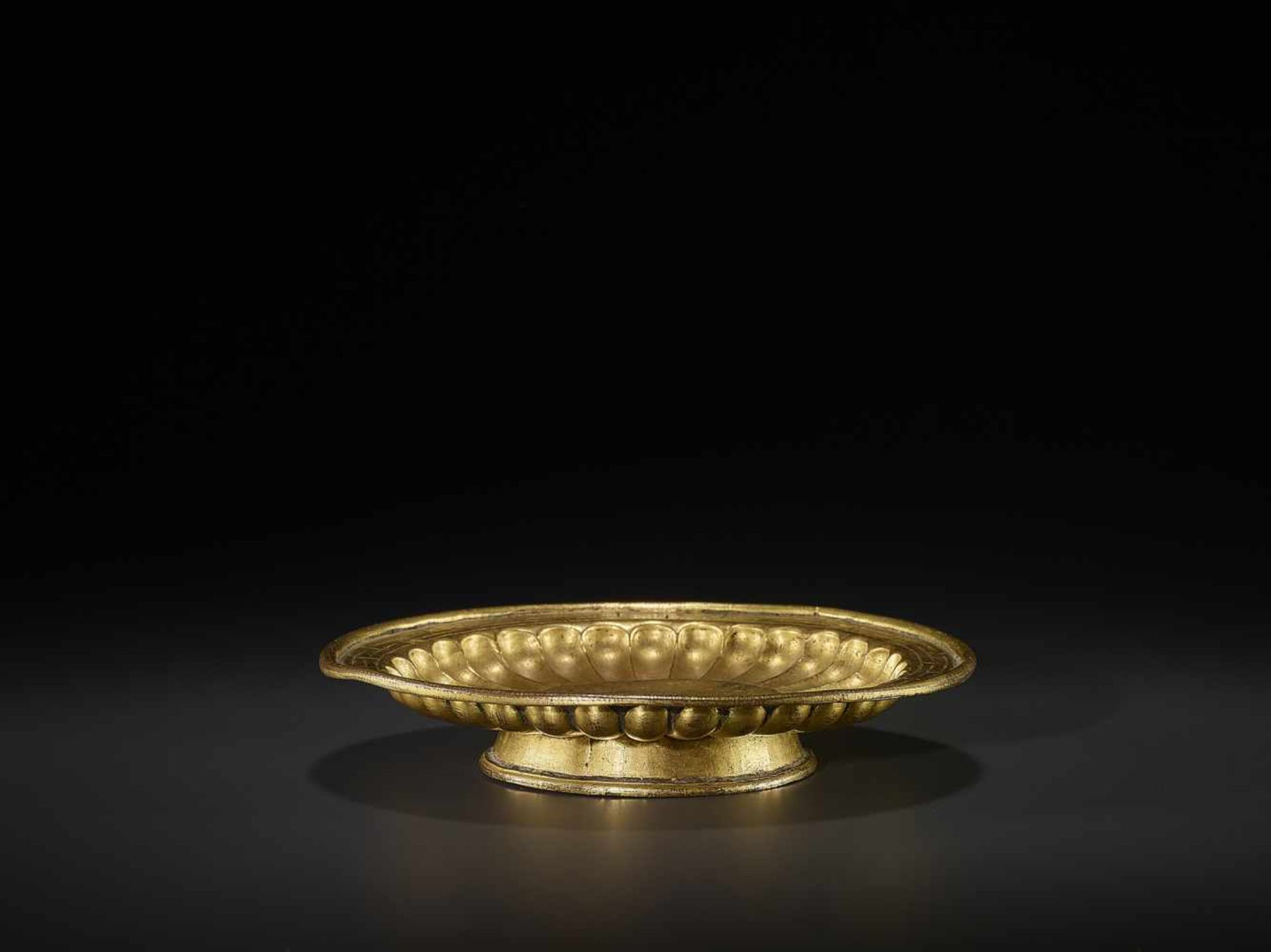 A GILT-BRONZE GANKYIL RITUAL BOWL Tibet, 13th – 14th Century. Finely worked with a central medallion - Image 7 of 8