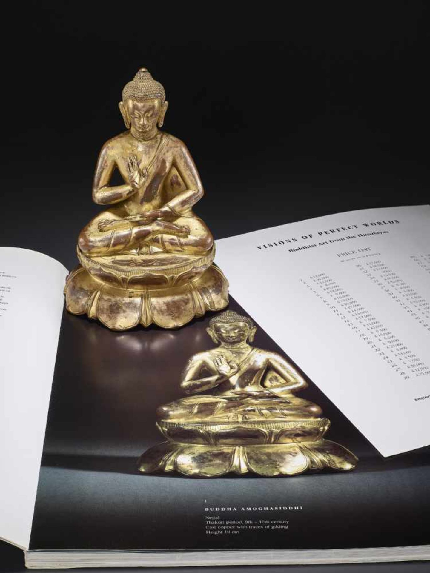 A BUDDHA AMOGHASIDDHI, NEPAL 17TH CENTURY The heavily cast gilt copper-alloy figure is seated in - Image 2 of 14