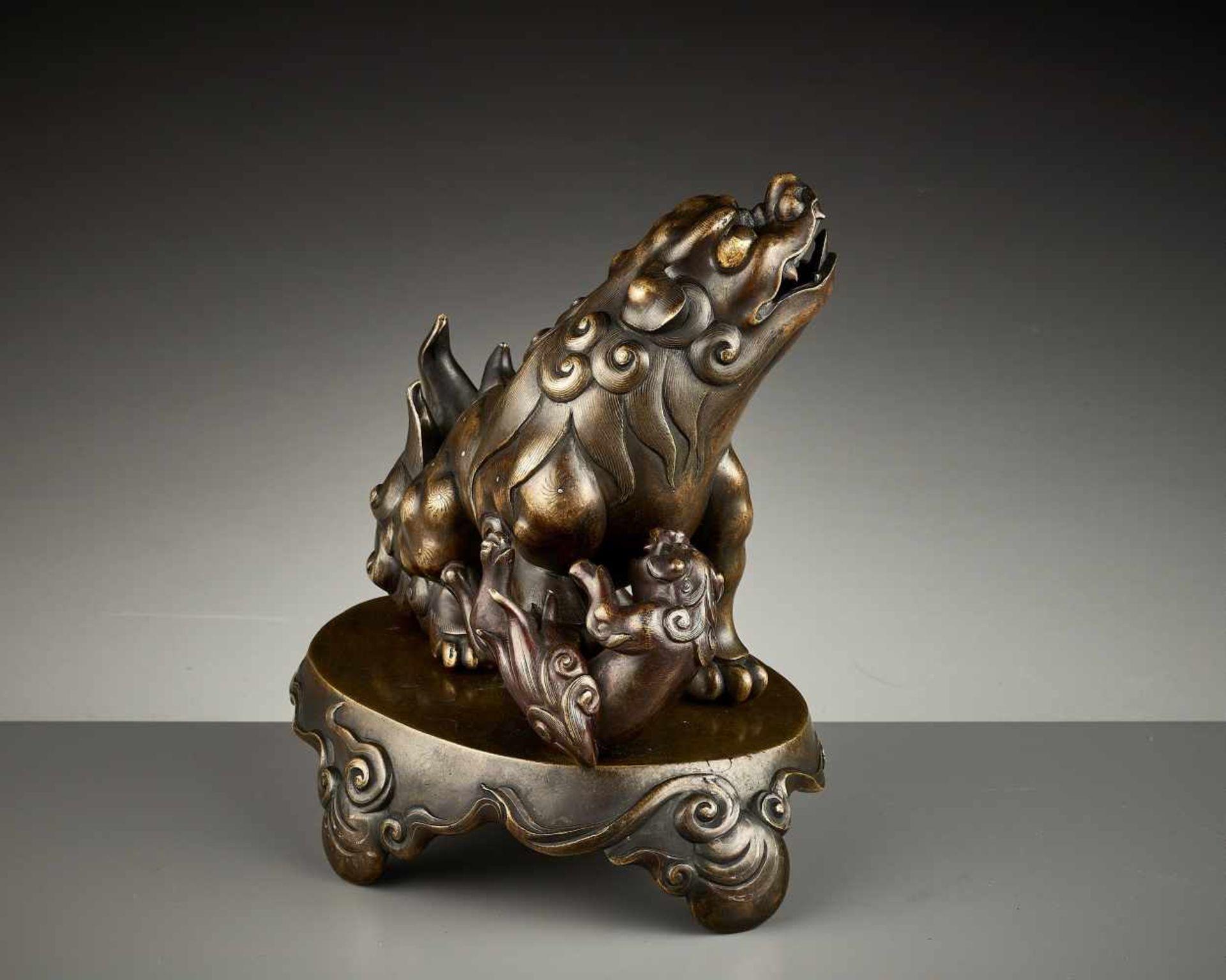 A SILVER- AND GOLD-INLAID BRONZE CENSER, KANGXI China, early 18th century. Heavily cast as a