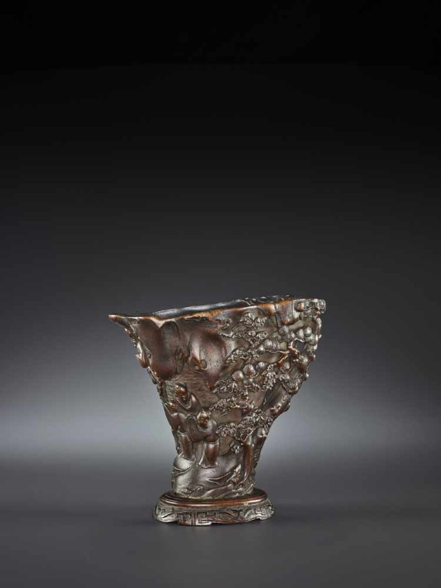 A LARGE RHINOCEROS HORN LIBATION CUP China, 17th – early 18th century. Finely carved in high - Image 4 of 17