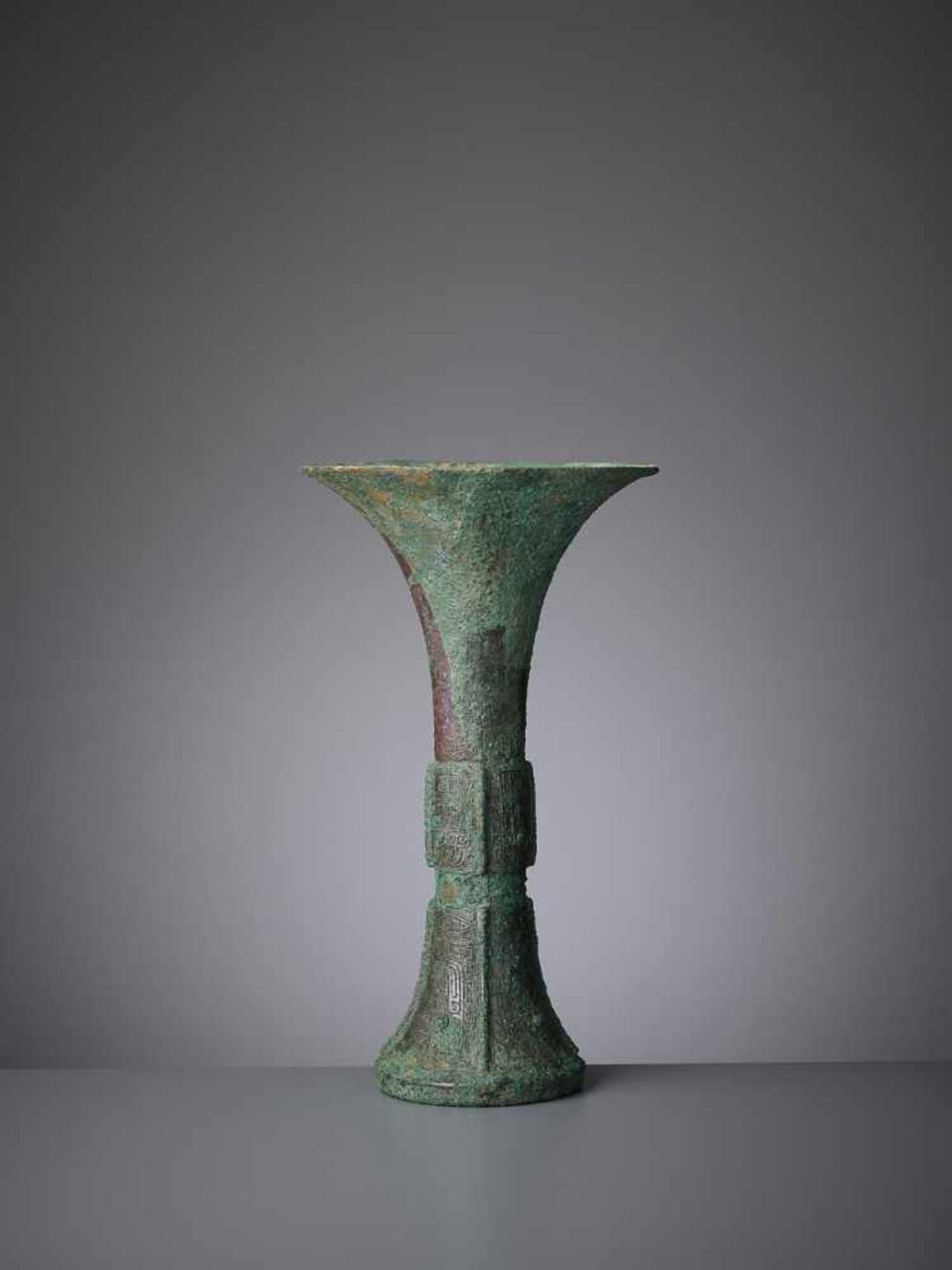 A BRONZE RITUAL WINE VESSEL, GU, SHANG DYNASTY China, late Shang dynasty, 13th-11th century BC. - Image 10 of 12