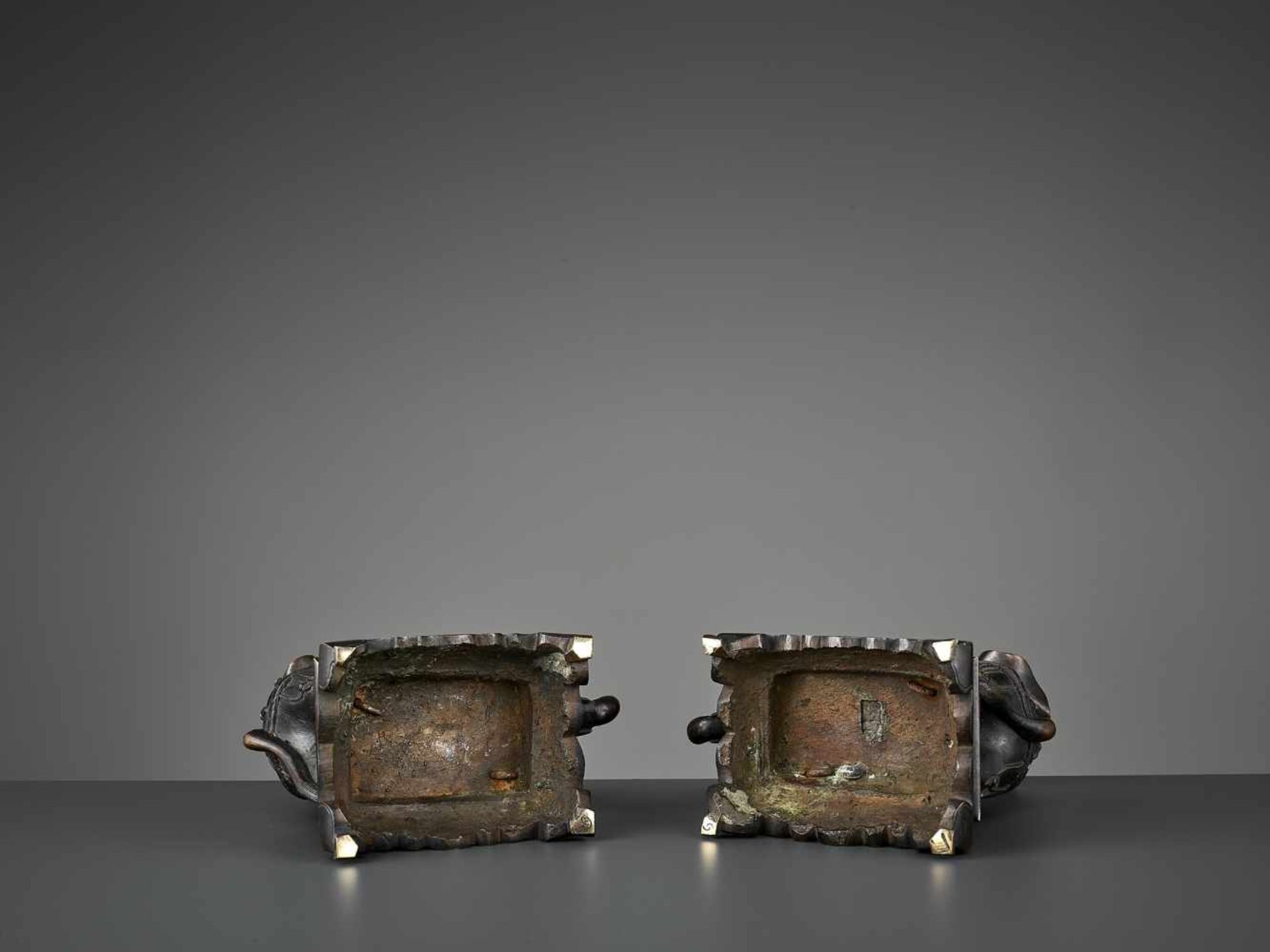 A PAIR OF CAPARISONED ELEPHANT BRONZES China, 17th-18th century. Shown on a stepped plinth with four - Image 10 of 11