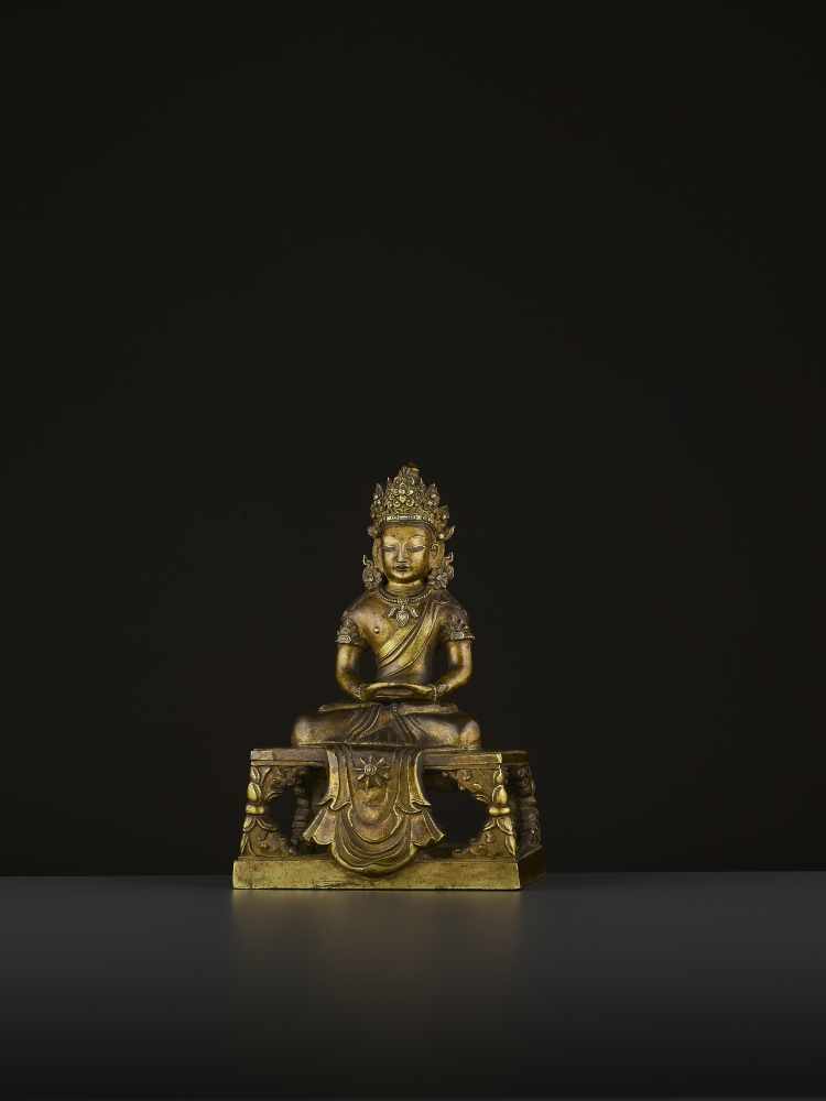 A GILT-BRONZE FIGURE OF AMITAYUS, QIANLONG China, 1736-1795. The figure is finely cast with legs