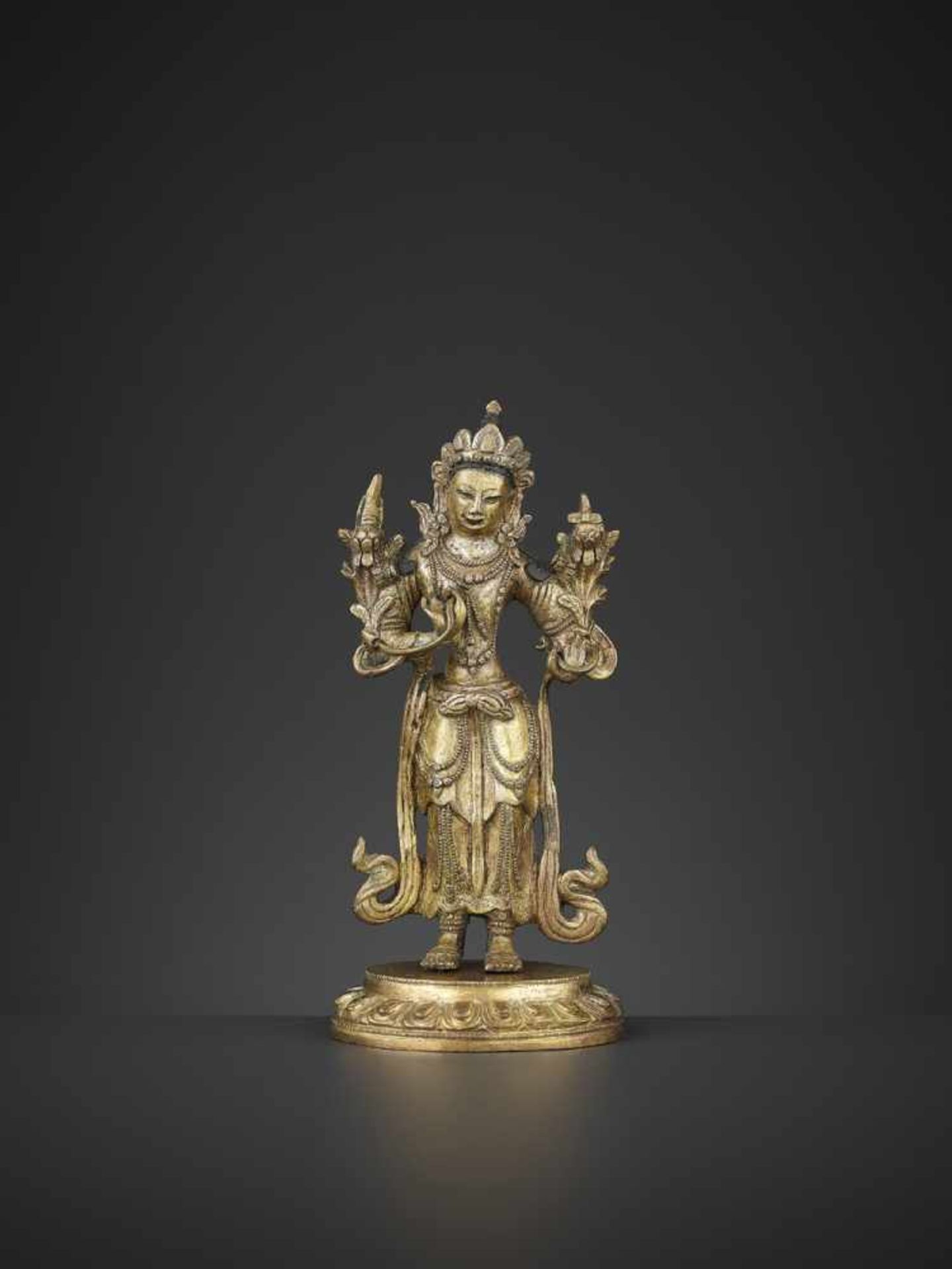 A GILT-BRONZE STANDING MANJUSHRI, QIANLONG China, 1736-1795. The proper right hand raised in vitarka - Image 2 of 10