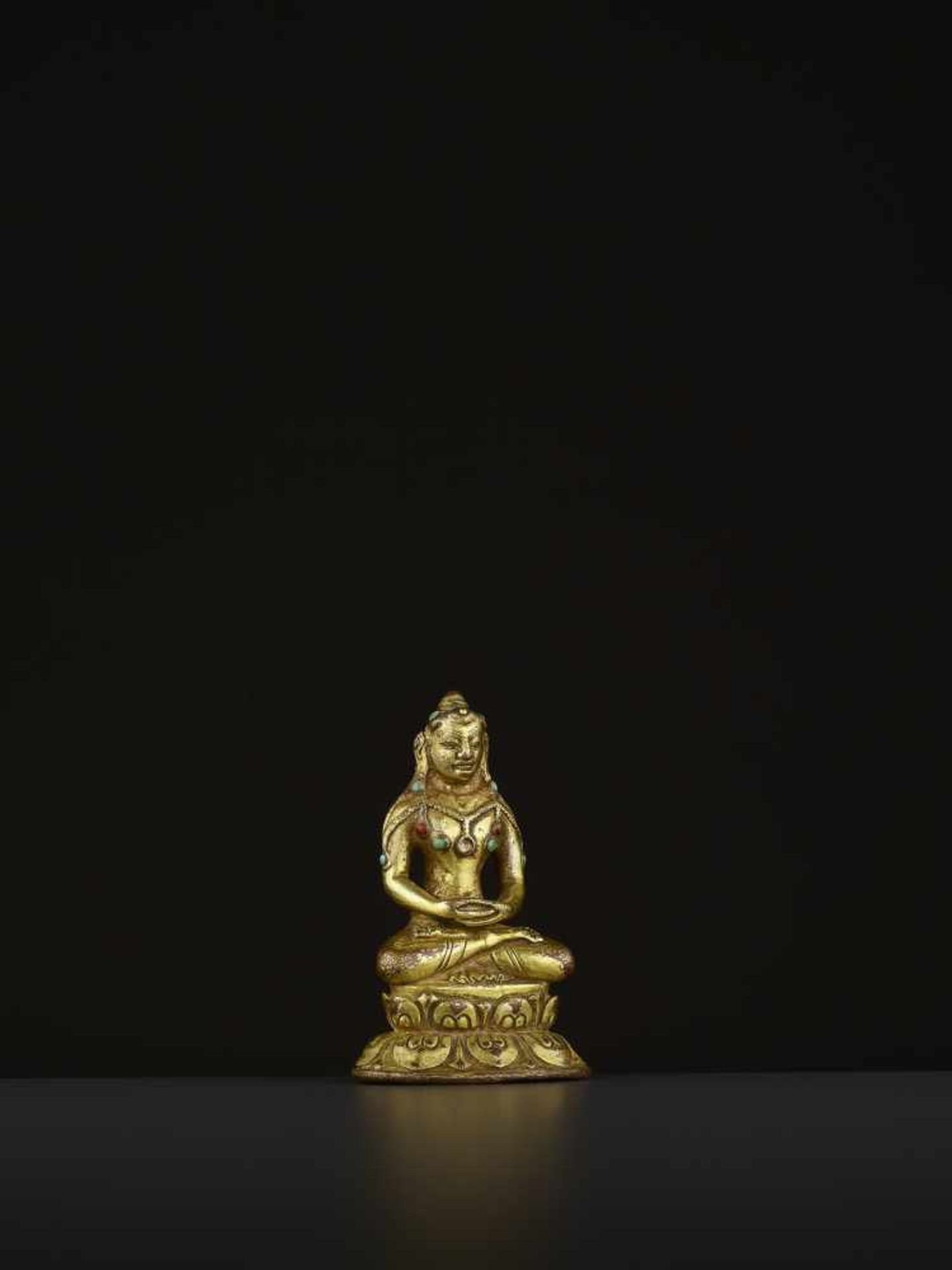 A GILT BRONZE MAHASIDDHA VIRUPA, 16TH CENTURY Tibet. Seated in dhyanasana on a double lotus base, - Image 7 of 11