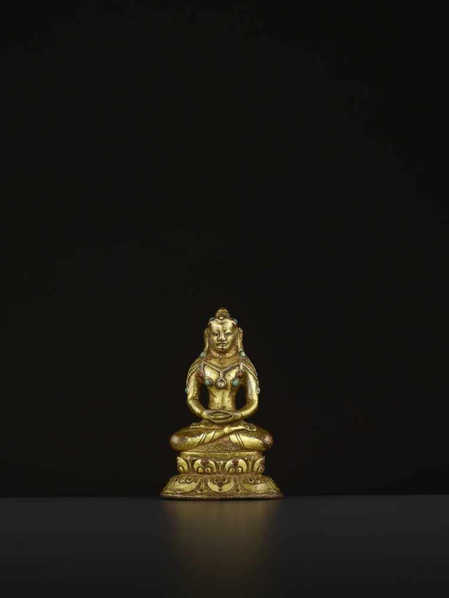 A GILT BRONZE MAHASIDDHA VIRUPA, 16TH CENTURY Tibet. Seated in dhyanasana on a double lotus base, - Image 3 of 11