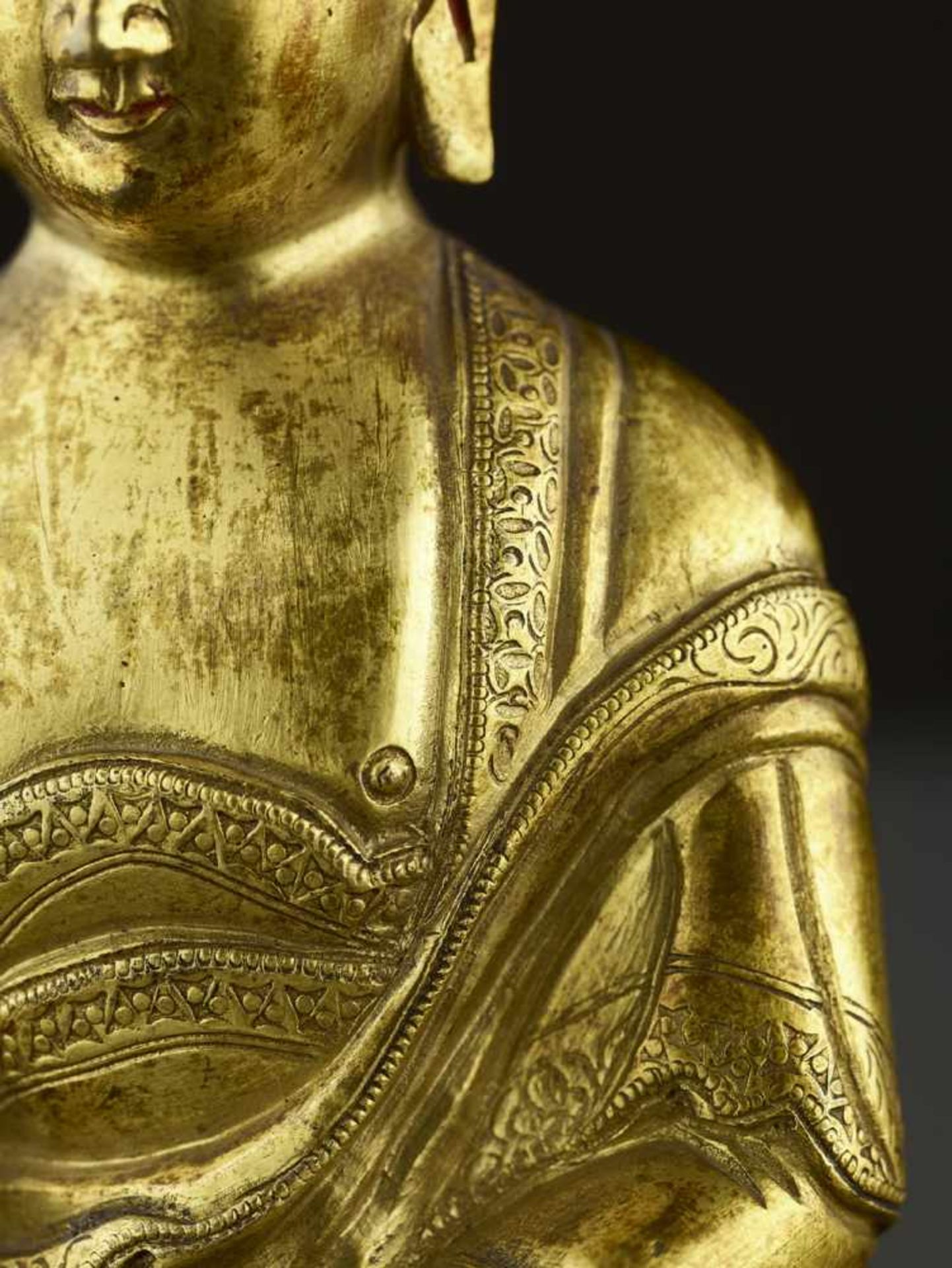 A GILT COPPER-ALLOY BUDDHA, QING China, 18th-19th century. The majestic deity is well cast seated in - Image 3 of 8