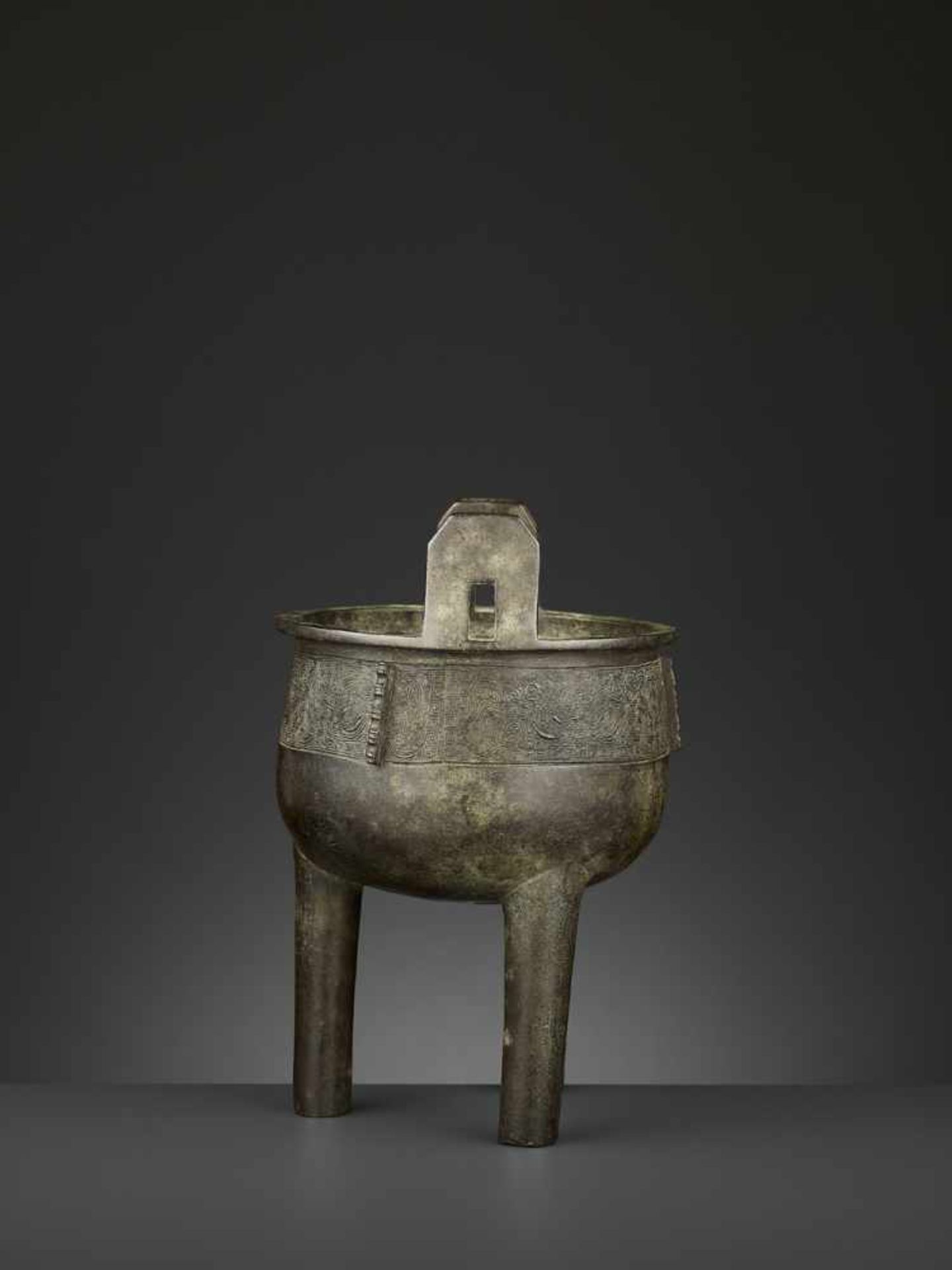 AN ARCHAISTIC BRONZE CENSER, DING China, 17th-18th century. The deep, bowl-shaped body supported - Image 3 of 10