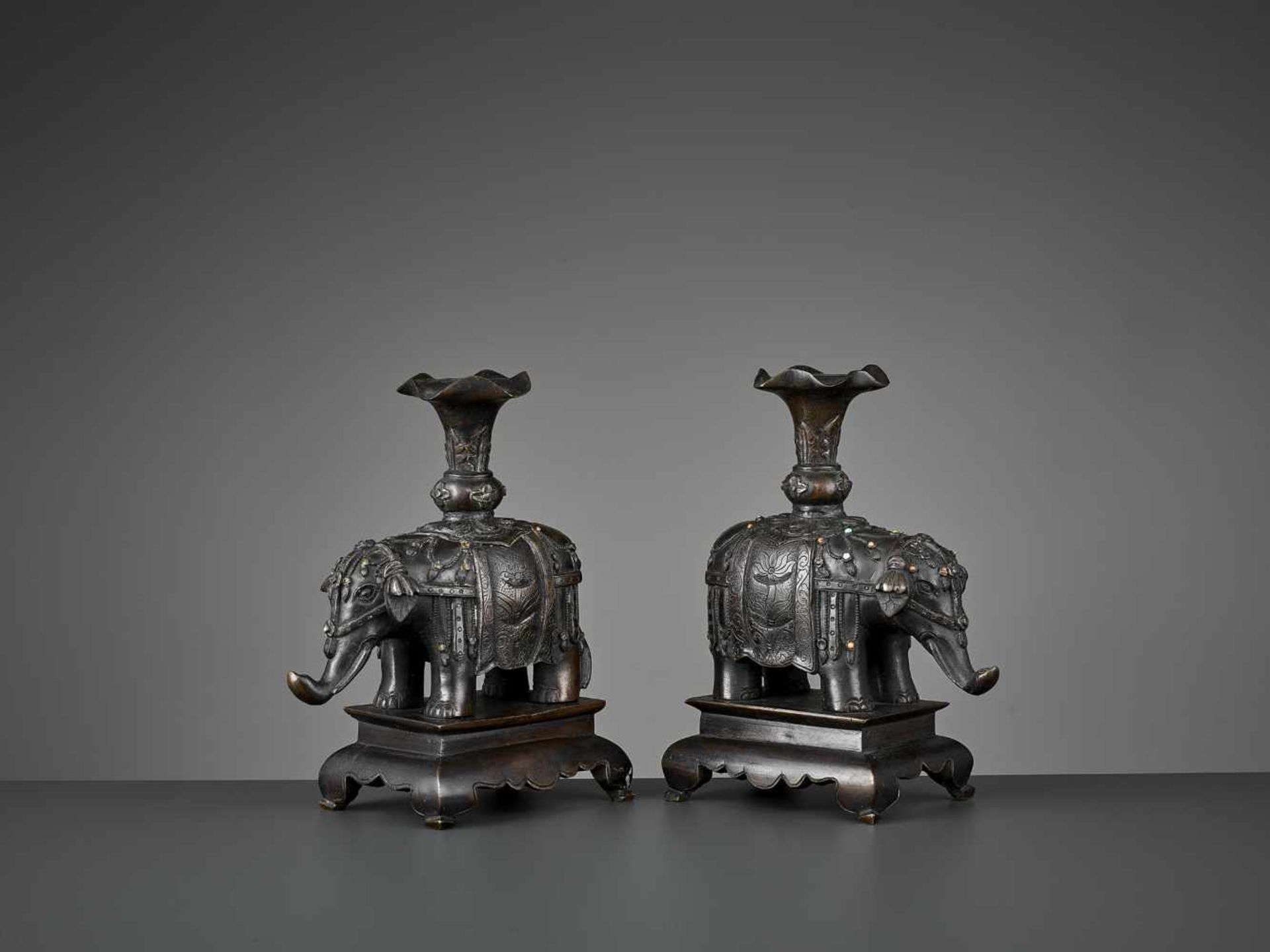 A PAIR OF CAPARISONED ELEPHANT BRONZES China, 17th-18th century. Shown on a stepped plinth with four - Image 6 of 11