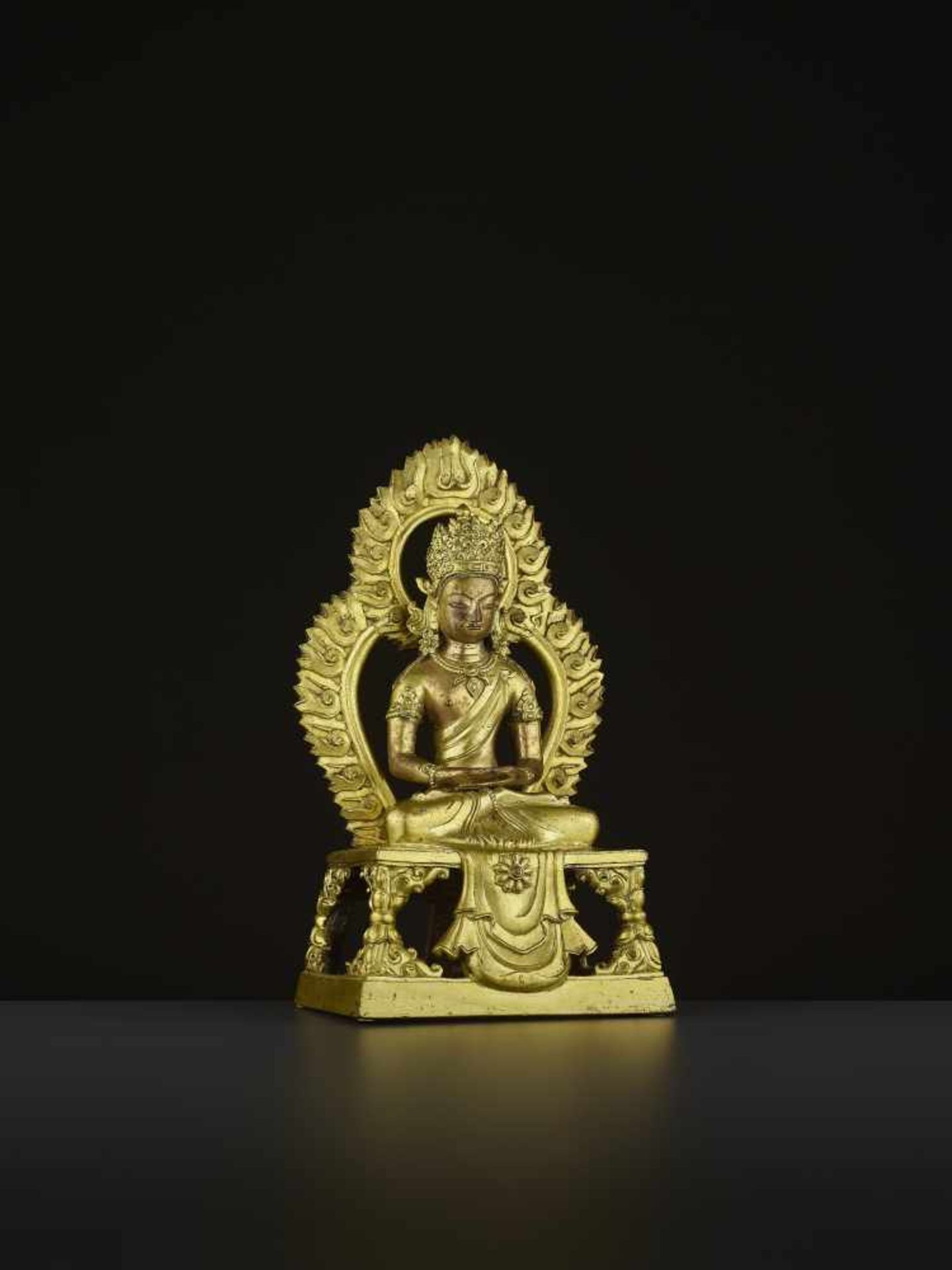 A GILT-BRONZE FIGURE OF AMITAYUS, QIANLONG China, 1736-1795. The figure is finely cast with legs - Image 7 of 9