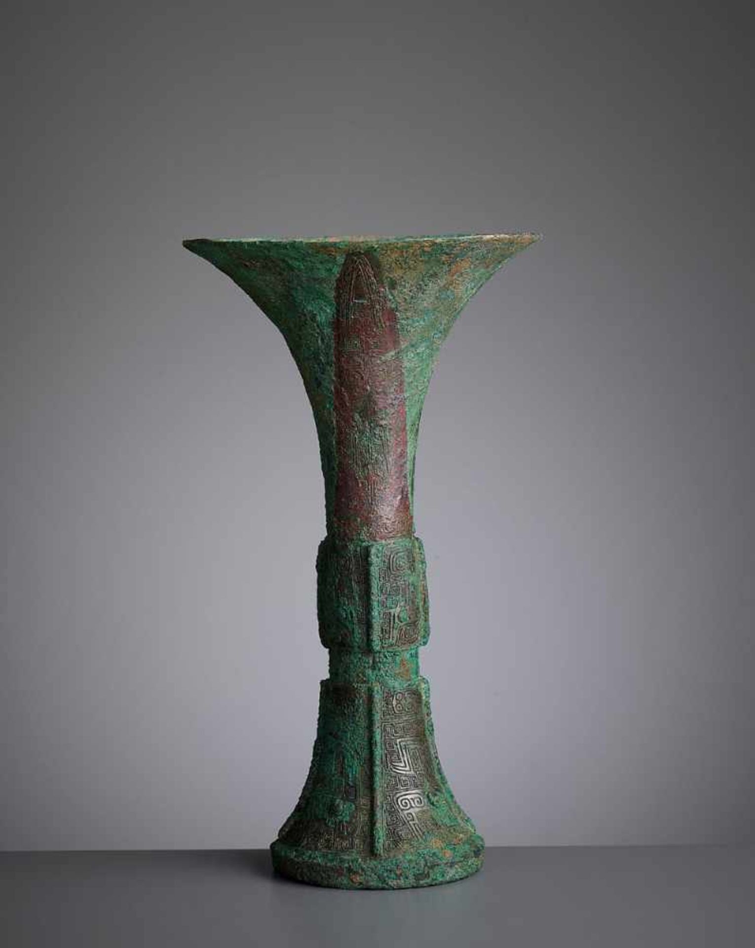 A BRONZE RITUAL WINE VESSEL, GU, SHANG DYNASTY China, late Shang dynasty, 13th-11th century BC.