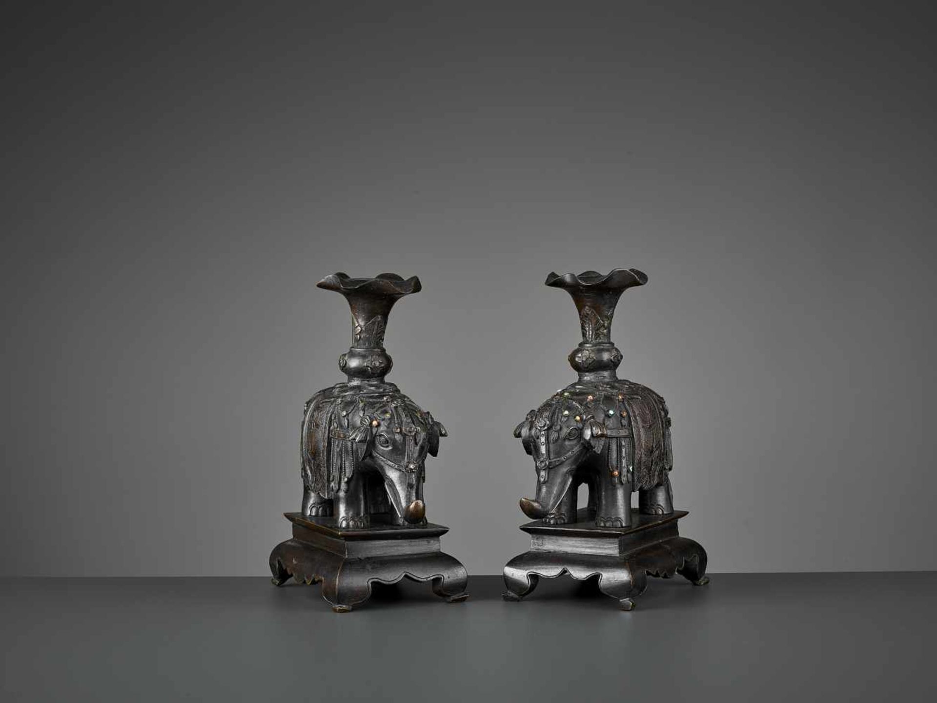 A PAIR OF CAPARISONED ELEPHANT BRONZES China, 17th-18th century. Shown on a stepped plinth with four - Image 4 of 11