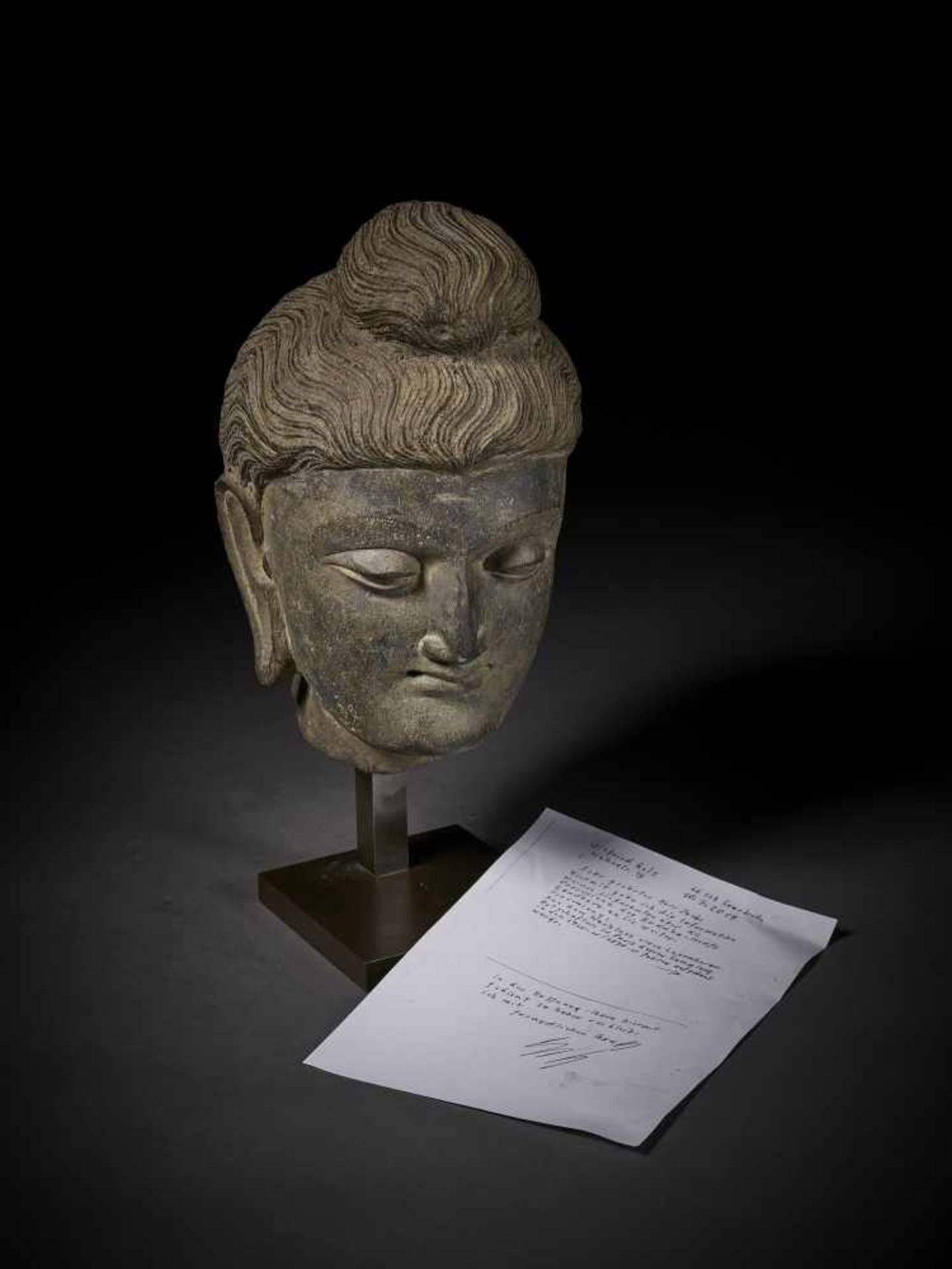 A LARGE HEAD OF BUDDHA, GANDHARA Ancient region of Gandhara, 3rd-4th century. Successfully evoking - Image 2 of 9