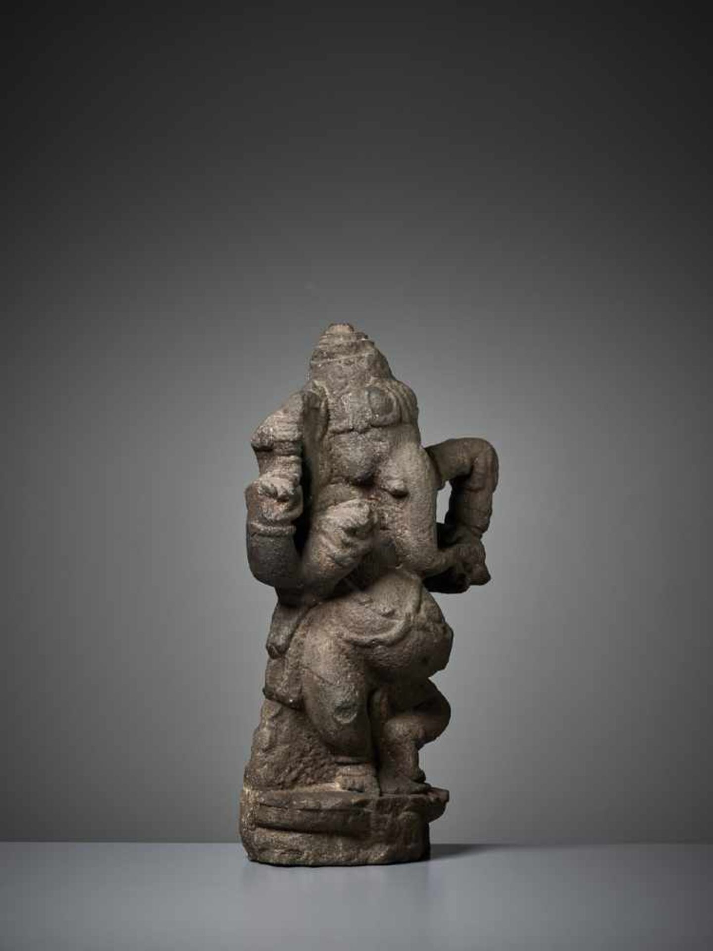 A RARE SANDSTONE STELE OF GANESHA India, 11th – 13th century. Dancing with one leg raised and his - Image 6 of 8