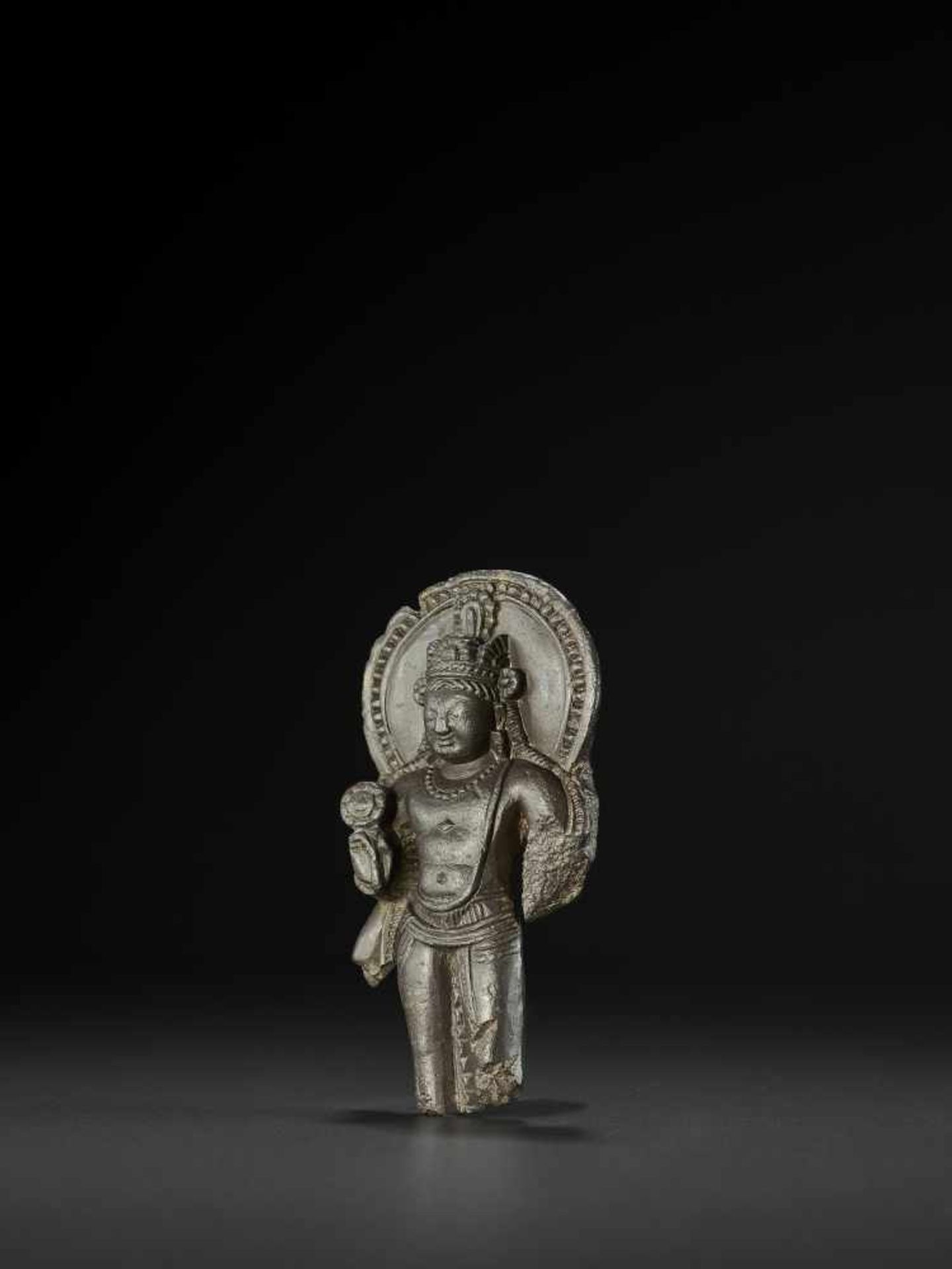 A STELE OF VISHNU, KASHMIR, 9TH CENTURY The black stone stele finely carved to depict Vishnu