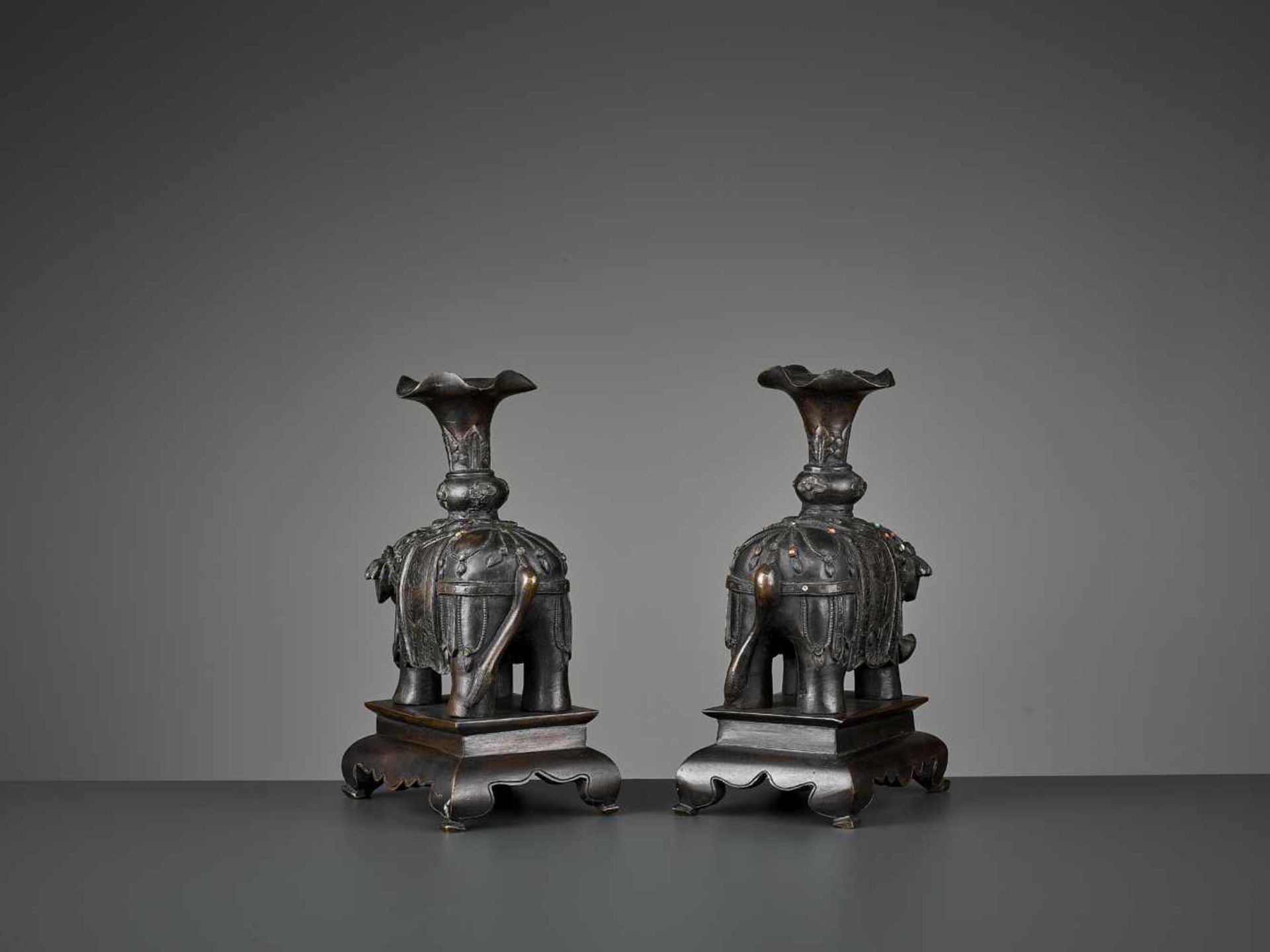 A PAIR OF CAPARISONED ELEPHANT BRONZES China, 17th-18th century. Shown on a stepped plinth with four - Image 8 of 11