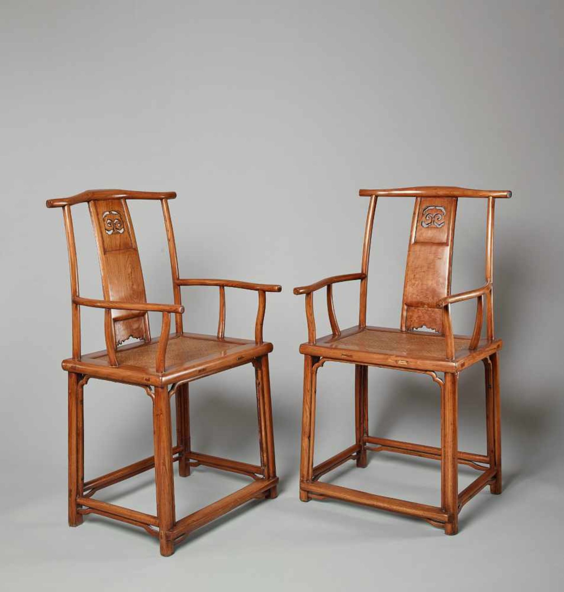 A PAIR OF YOKEBACK ARMCHAIRS, SICHUTOU GUANMAOYI China, 18th- early 19th century. Jumu. The backrest