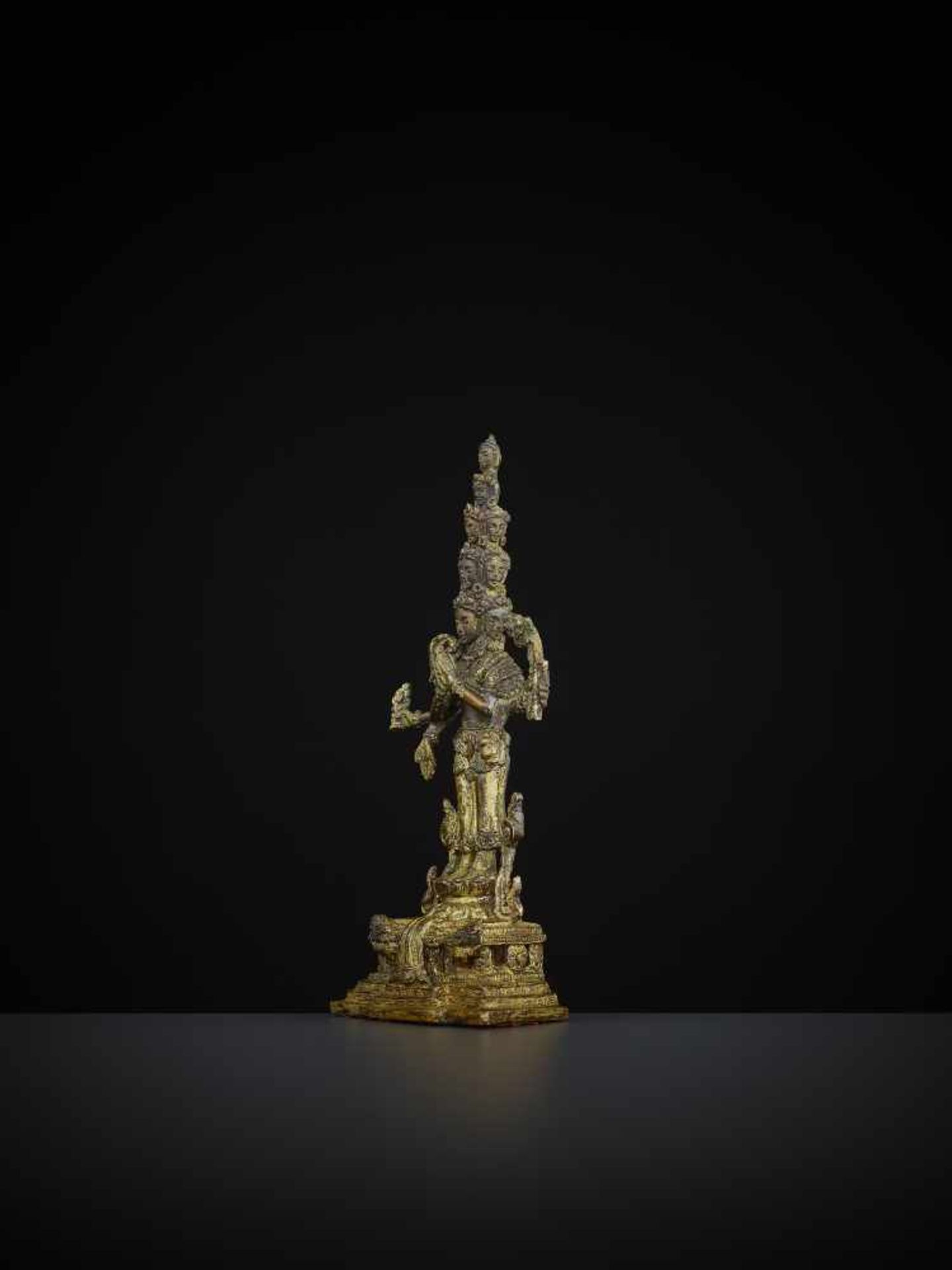 AN EKADASHAMUKHA BRONZE 18TH CENTURY Sino-Tibetan. Gilt and finely incised bronze with - Image 3 of 8