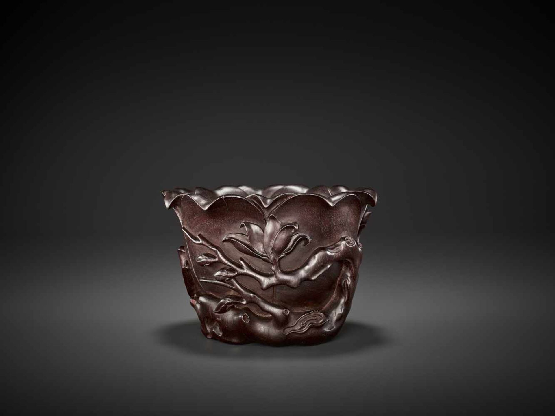 A ZITAN LIBATION CUP, QING DYNASTY China, 18th - 19th century. Finely carved and reticulated as a