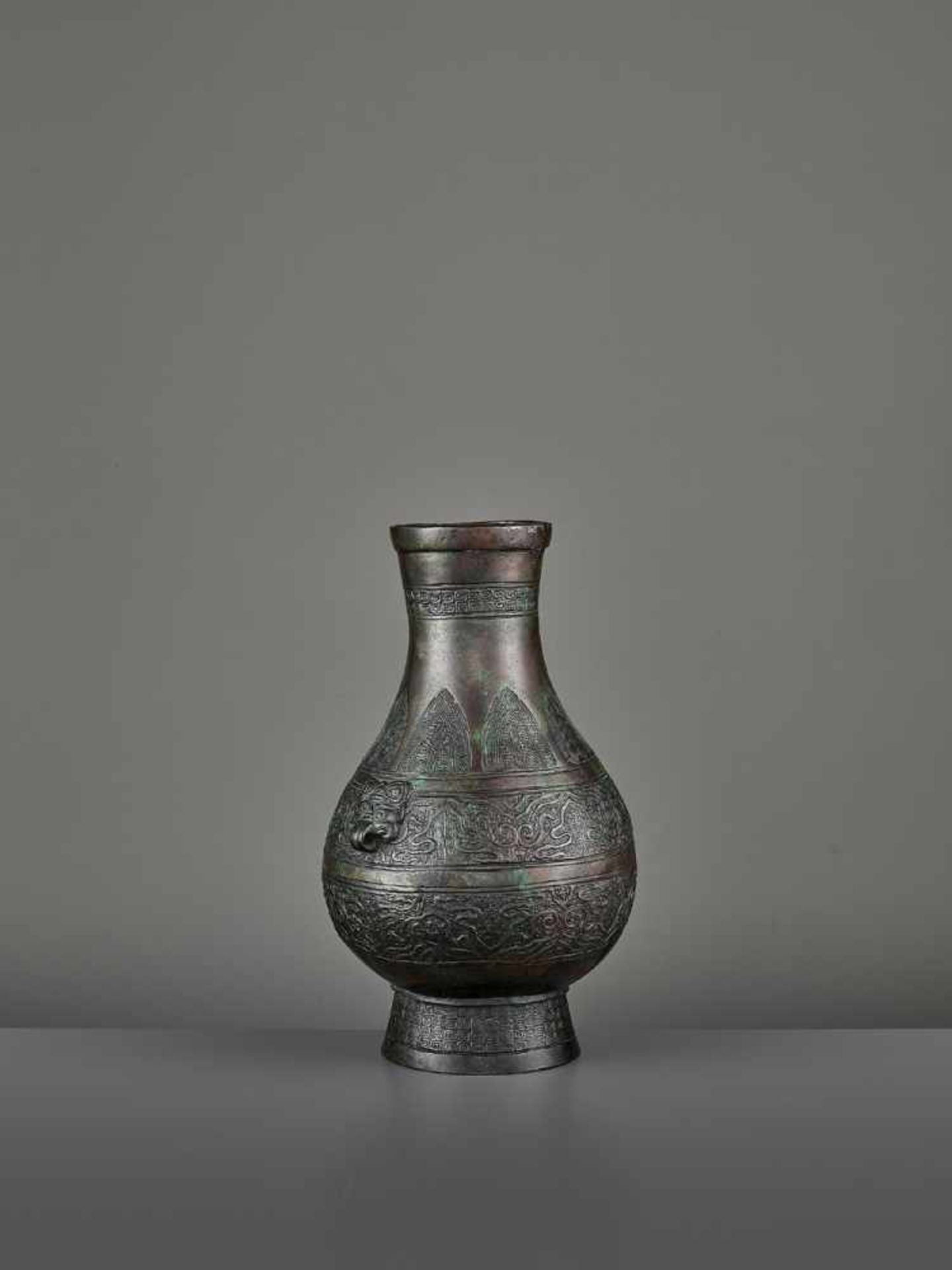 A BRONZE RITUAL VASE, HU China, Ming dynasty (1368-1644) or earlier. The archaistic vessel is cast - Image 8 of 11