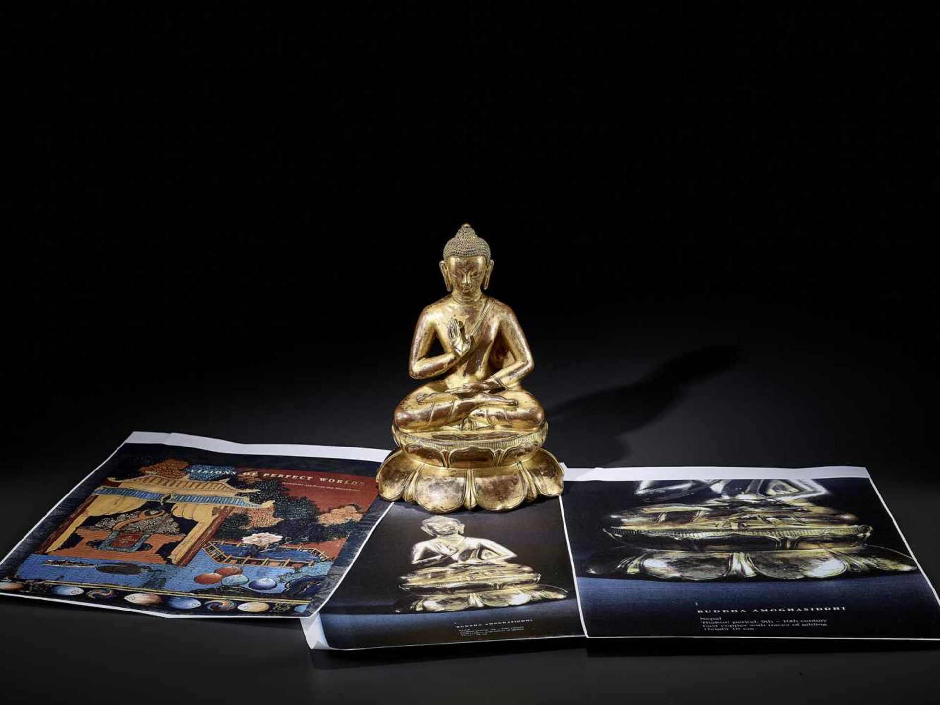 A BUDDHA AMOGHASIDDHI, NEPAL 17TH CENTURY The heavily cast gilt copper-alloy figure is seated in - Image 11 of 14