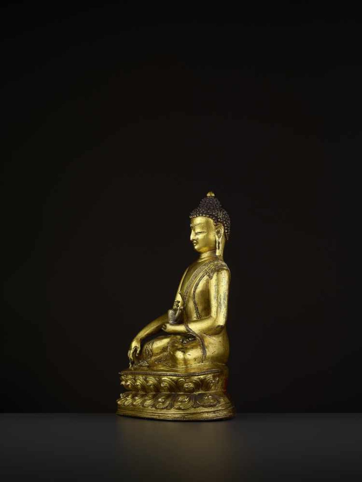 A GILT BRONZE BUDDHA VAJRASANA Tibet, 14th - 16th century. A superb fire-gilt bronze of Buddha - Image 4 of 14