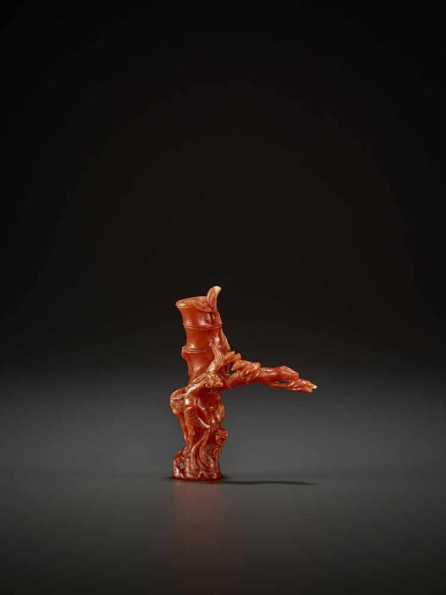 A CORAL JOSS STICK HOLDER, QING China, 1760-1860. Finely carved in the form of a bamboo with
