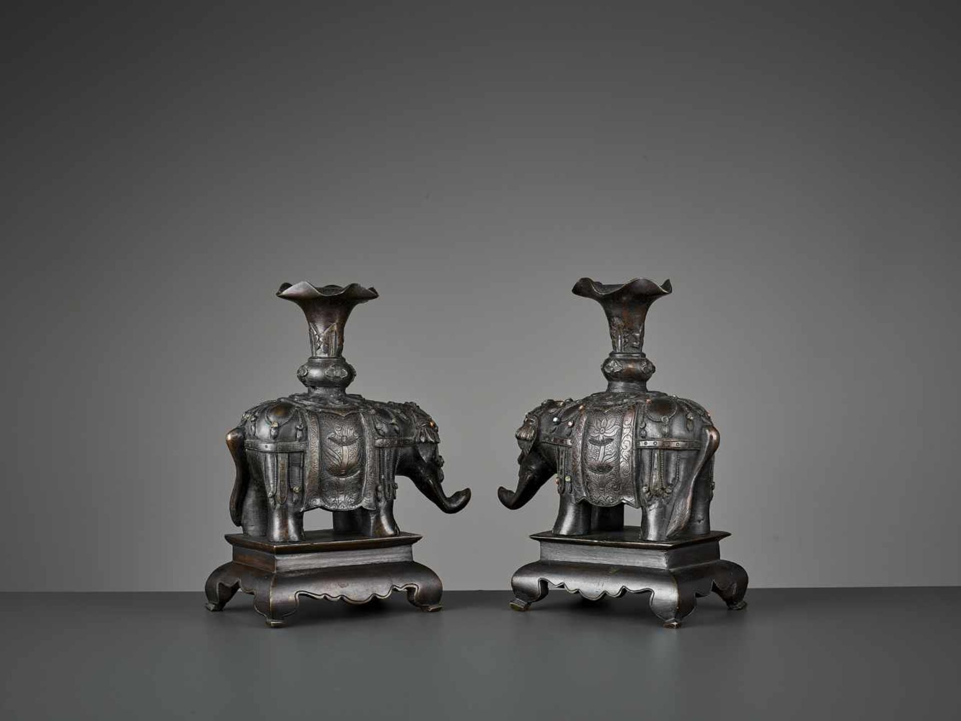 A PAIR OF CAPARISONED ELEPHANT BRONZES China, 17th-18th century. Shown on a stepped plinth with four - Image 9 of 11