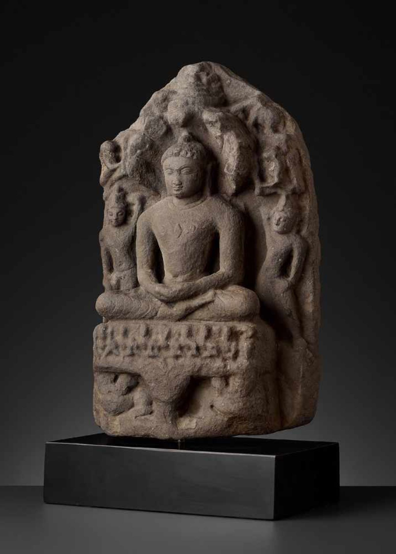 A RARE STELE OF PARSHVANATHA TIRTHANKARA Central India, 11th - 12th century. The sandstone carved in