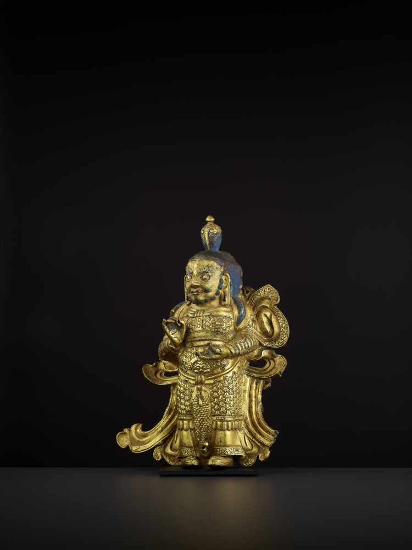 A GILT COPPER GUARDIAN KING, TIBET 17TH CENTURY In this imposing Densatil school repoussé work, - Image 2 of 6