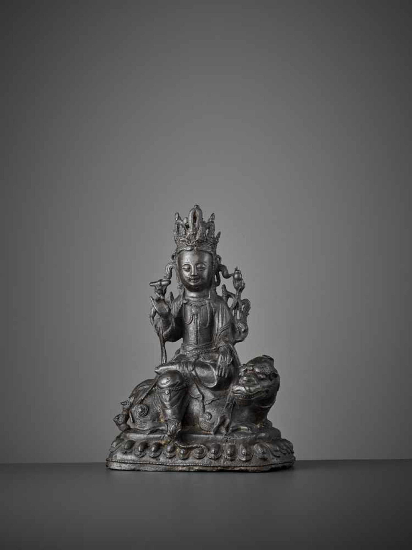 A BRONZE FIGURE OF WENSHU, MING DYNASTY China, 1368-1644. The bejeweled Wisdom Bodhisattva is cast - Image 2 of 10