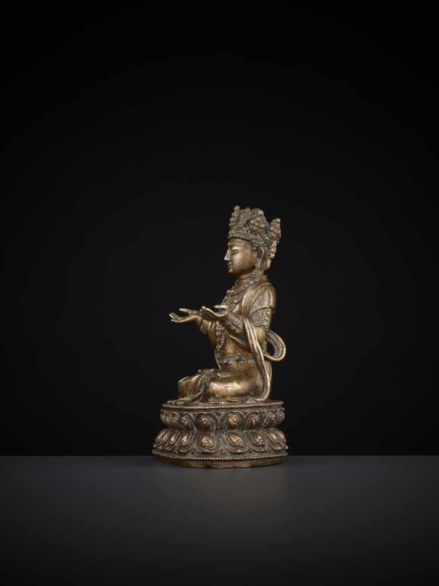 A COPPER-BRONZE STATUE OF BODHISATTVA Tibetan-Chinese, 15th – 16th century. Bodhisattva is seated in - Image 5 of 11