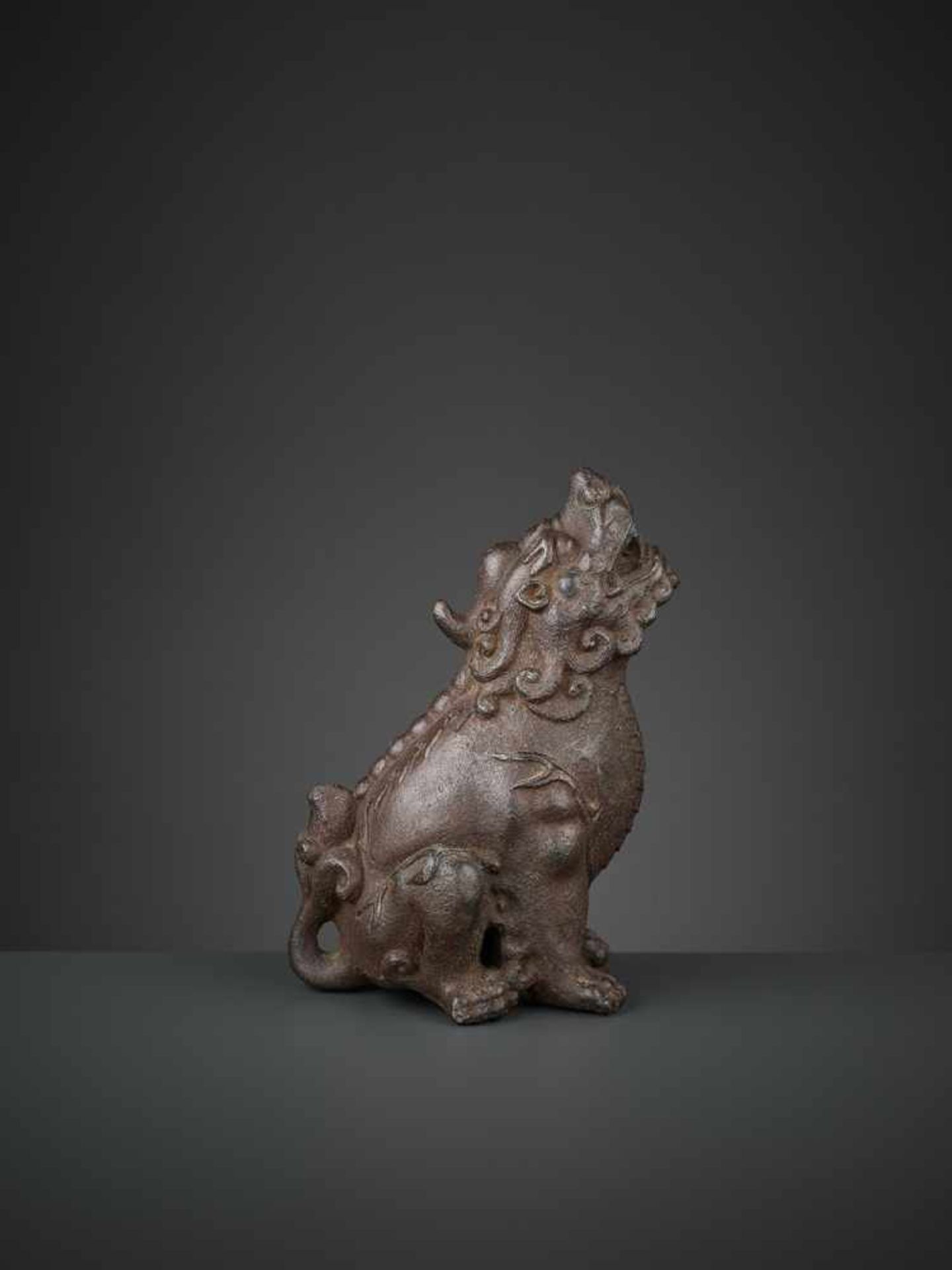 A ROARING QILIN, EARLY MING DYNASTY China, 14th-15th century. The mythical beast well cast and - Image 9 of 10