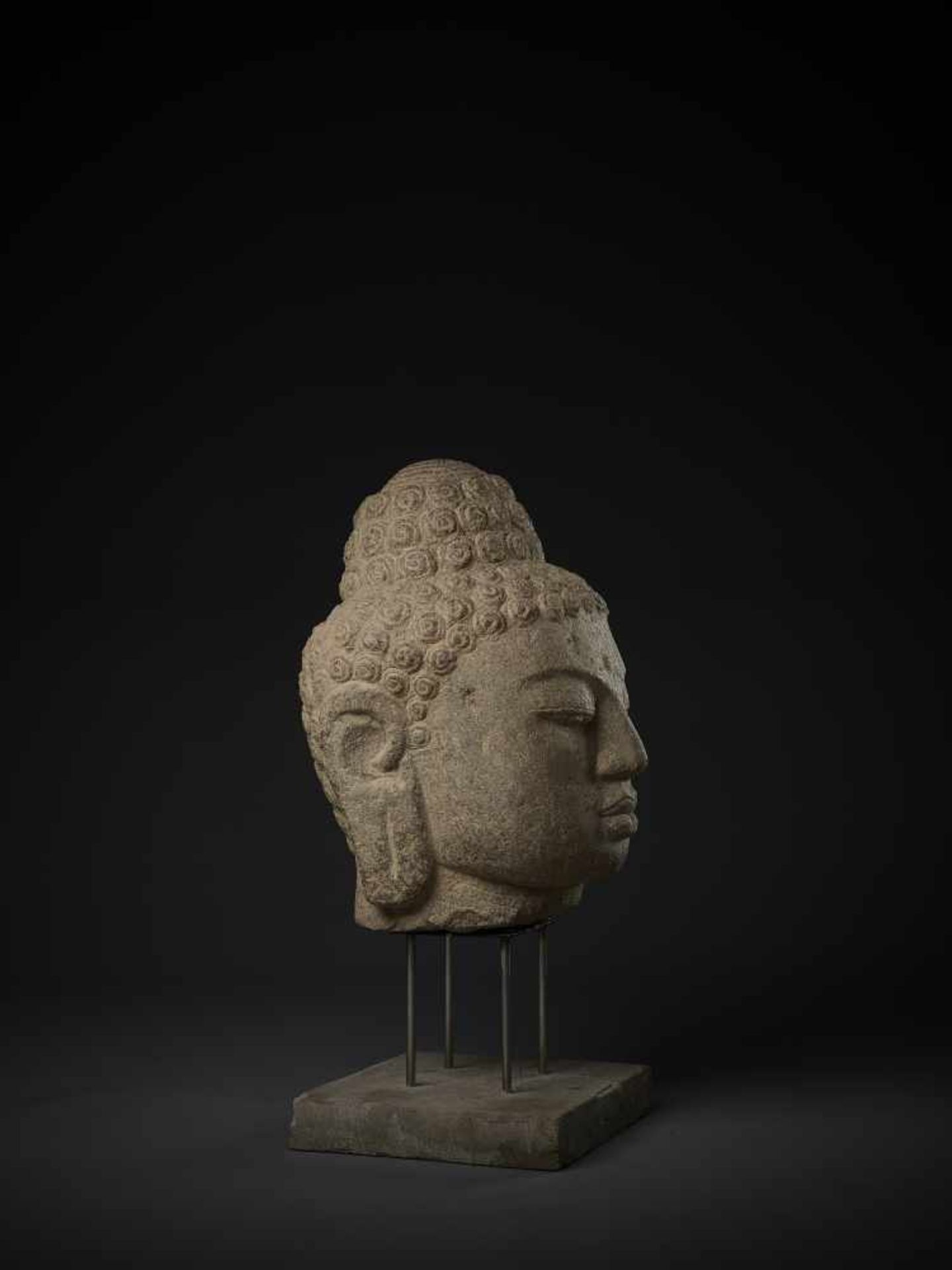 A LARGE AND IMPORTANT ANDESITE HEAD OF BUDDHA Indonesia, Central Java, 9th-10th century. Finely - Image 6 of 9