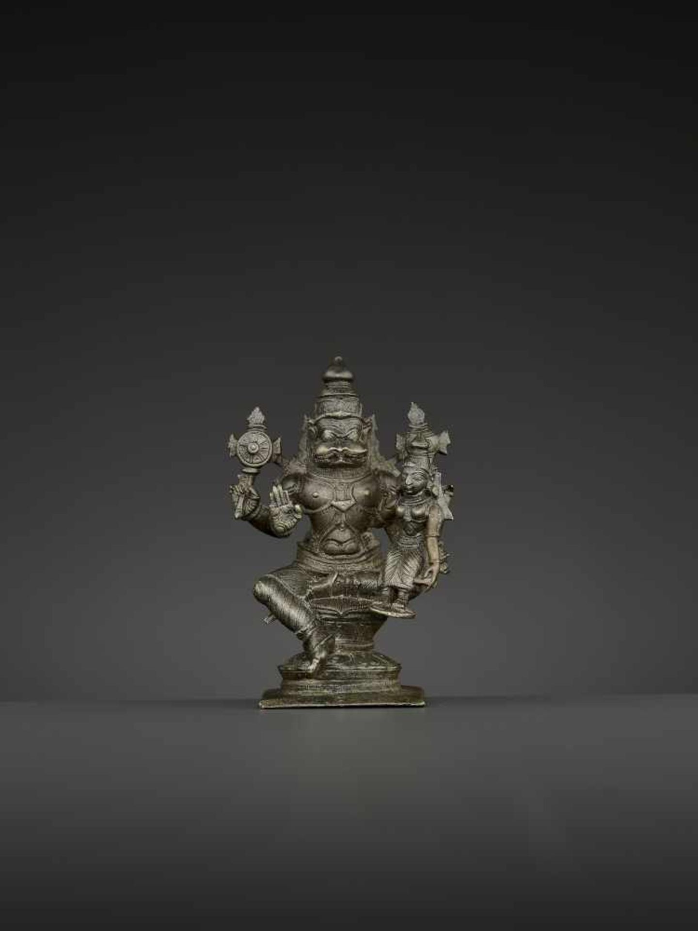 A NARASIMHA LAKSHMI BRONZE South India, Tamil Nadu, 18th – 19th century. The lion deity Narasimha is - Image 2 of 7