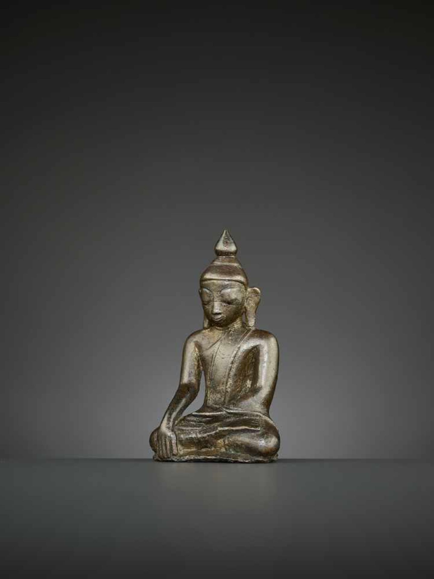 A BUDDHA BRONZE, BURMA, 14TH CENTURY The superbly cast statue depicting Shakyamuni seated in - Image 3 of 8