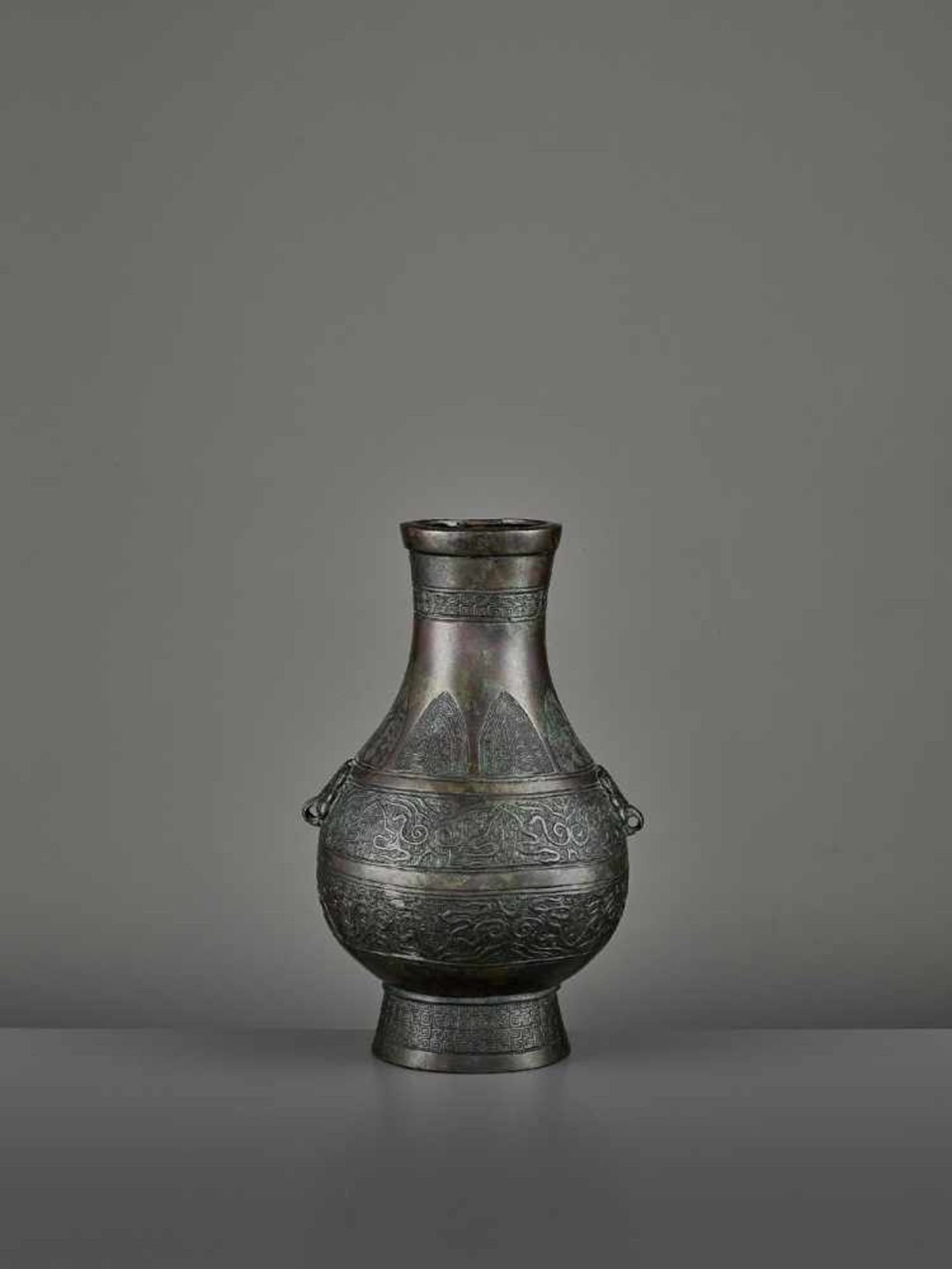 A BRONZE RITUAL VASE, HU China, Ming dynasty (1368-1644) or earlier. The archaistic vessel is cast - Image 6 of 11