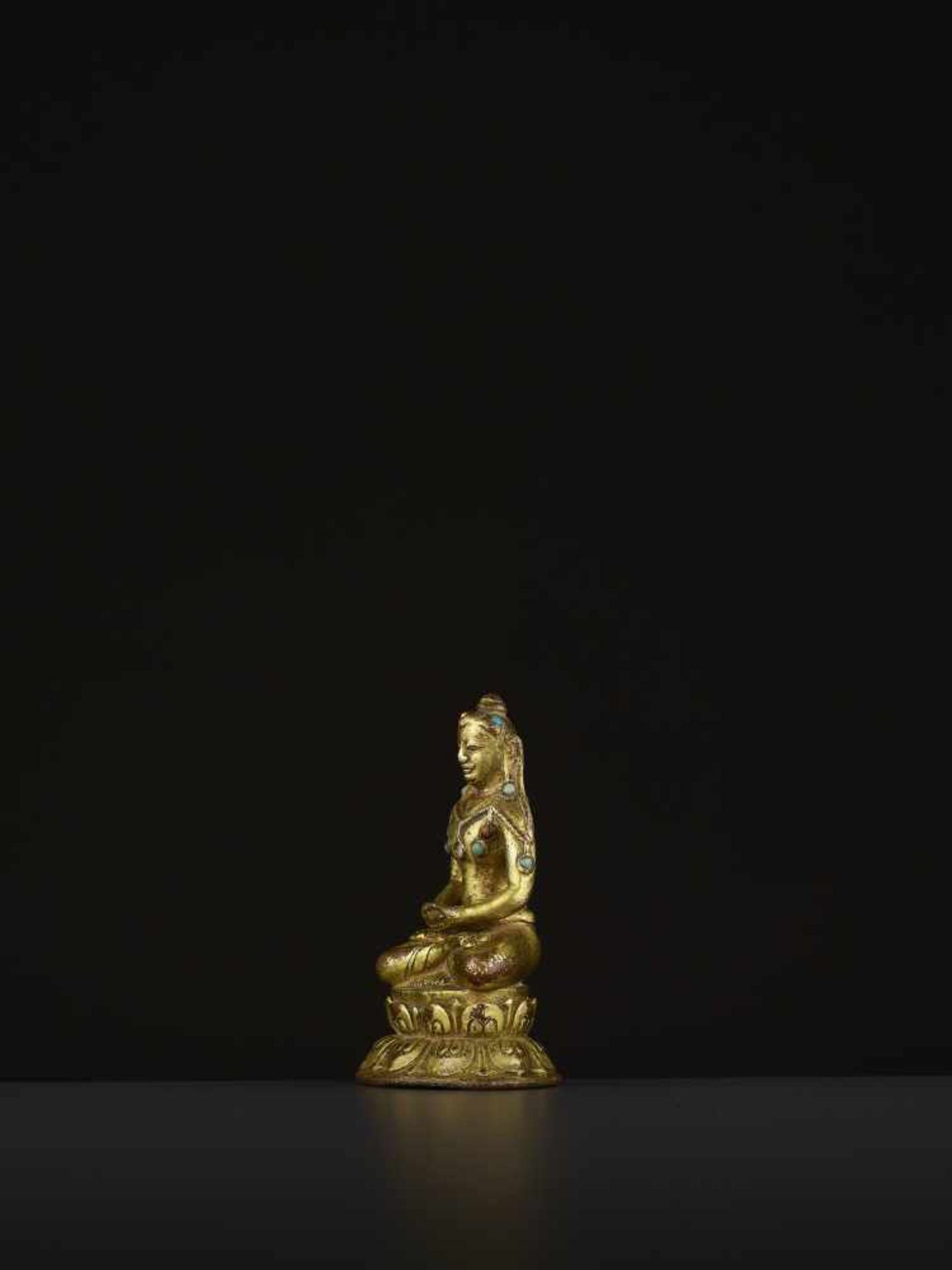A GILT BRONZE MAHASIDDHA VIRUPA, 16TH CENTURY Tibet. Seated in dhyanasana on a double lotus base, - Image 4 of 11