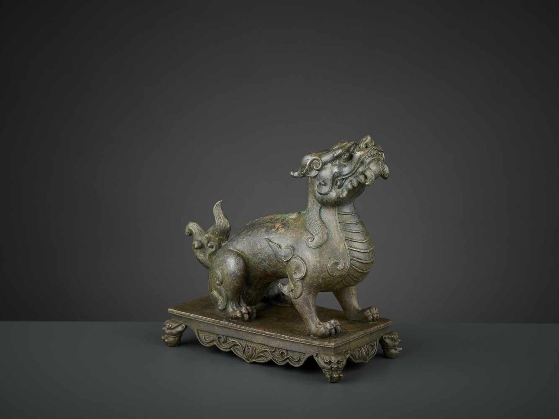 A BRONZE FIGURE OF A QILIN, QIANLONG SIX-CHARACTER MARK AND OF THE PERIOD China, 1736-1795. The - Image 9 of 15