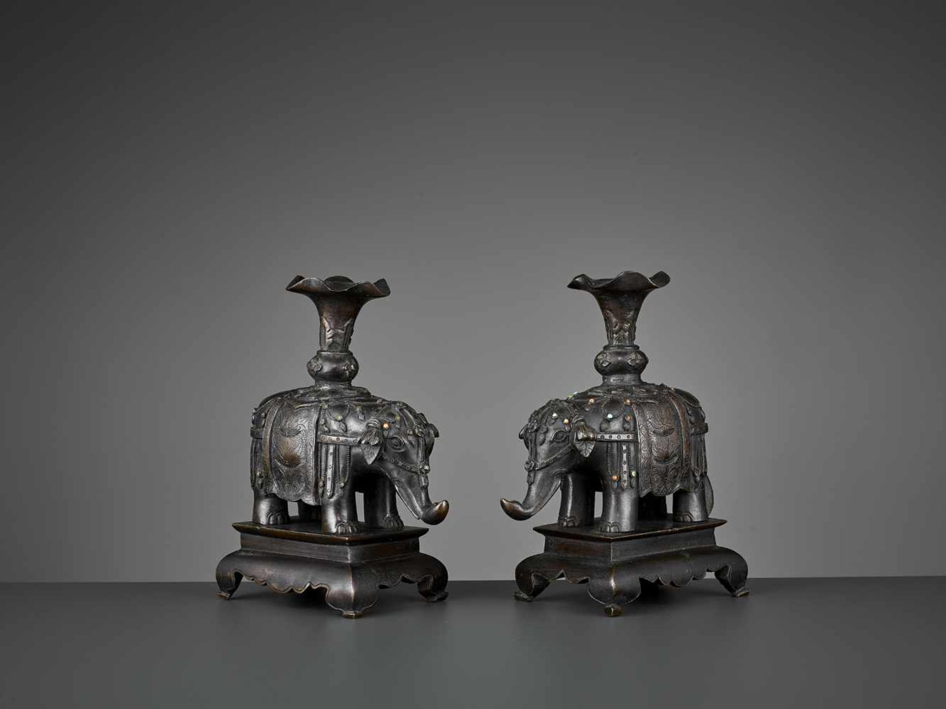 A PAIR OF CAPARISONED ELEPHANT BRONZES China, 17th-18th century. Shown on a stepped plinth with four - Image 3 of 11