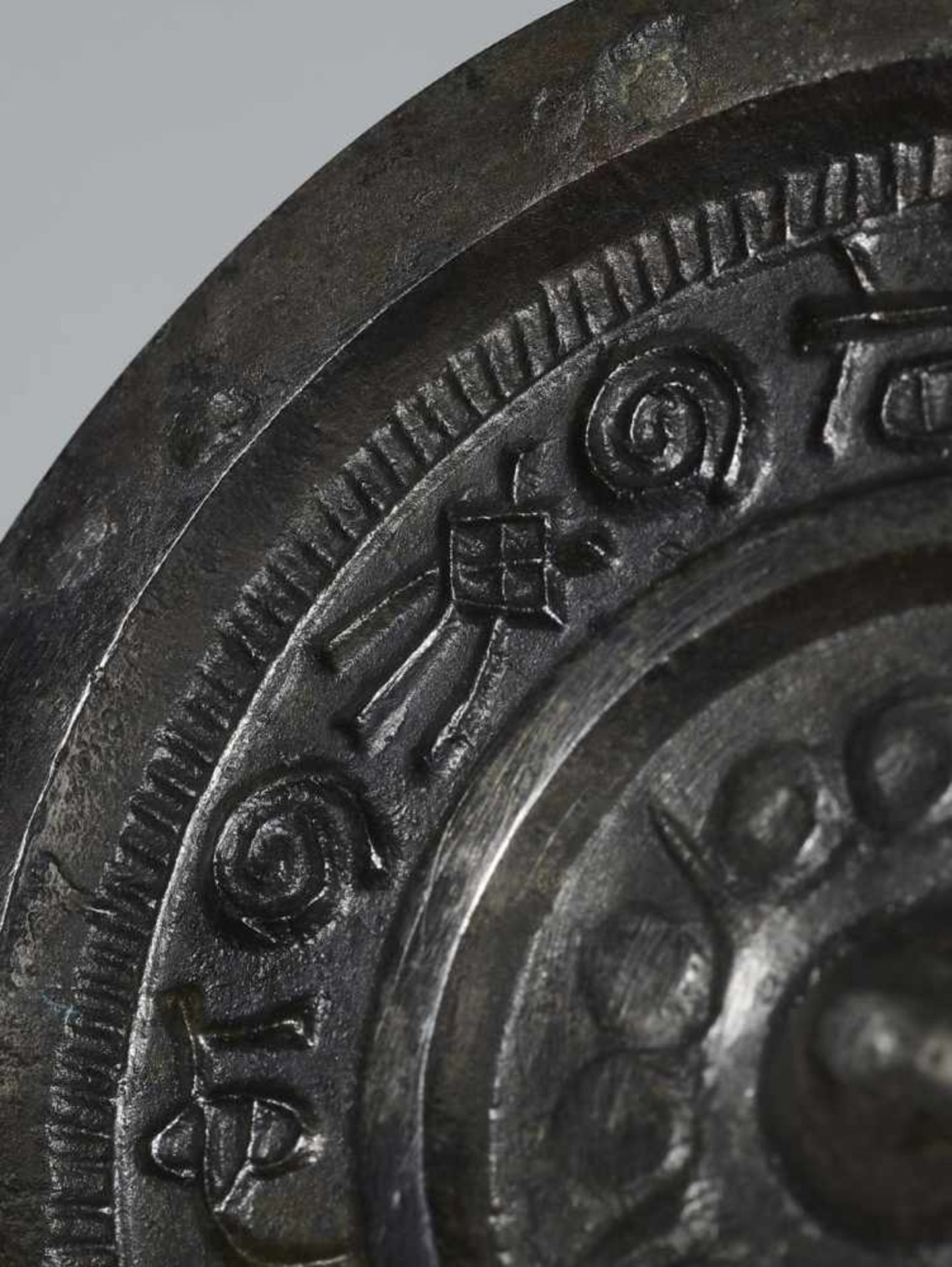 AN INSCRIBED BRONZE MIRROR China, 3rd – 4th century. The suspension knob surrounded by two - Image 4 of 7