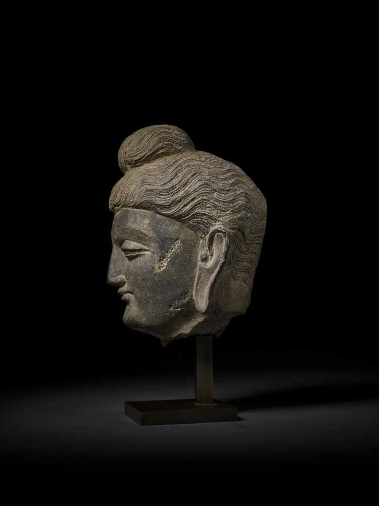 A LARGE HEAD OF BUDDHA, GANDHARA Ancient region of Gandhara, 3rd-4th century. Successfully evoking - Image 5 of 9