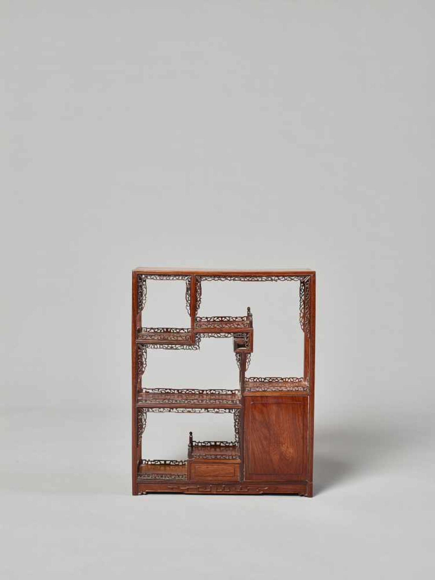 A HARDWOOD DISPLAY TABLE-CABINET, LATE QING DYNASTY China, 19th – earlier 20th century. The wood - Image 5 of 8