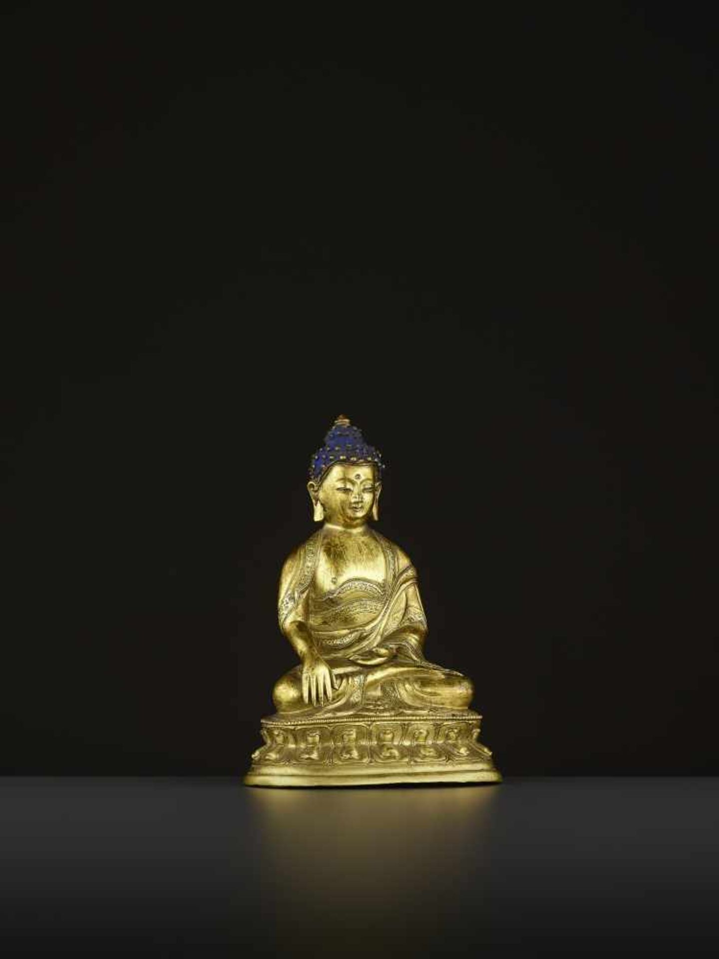 A GILT COPPER-ALLOY BUDDHA, QING China, 18th-19th century. The majestic deity is well cast seated in - Image 7 of 8