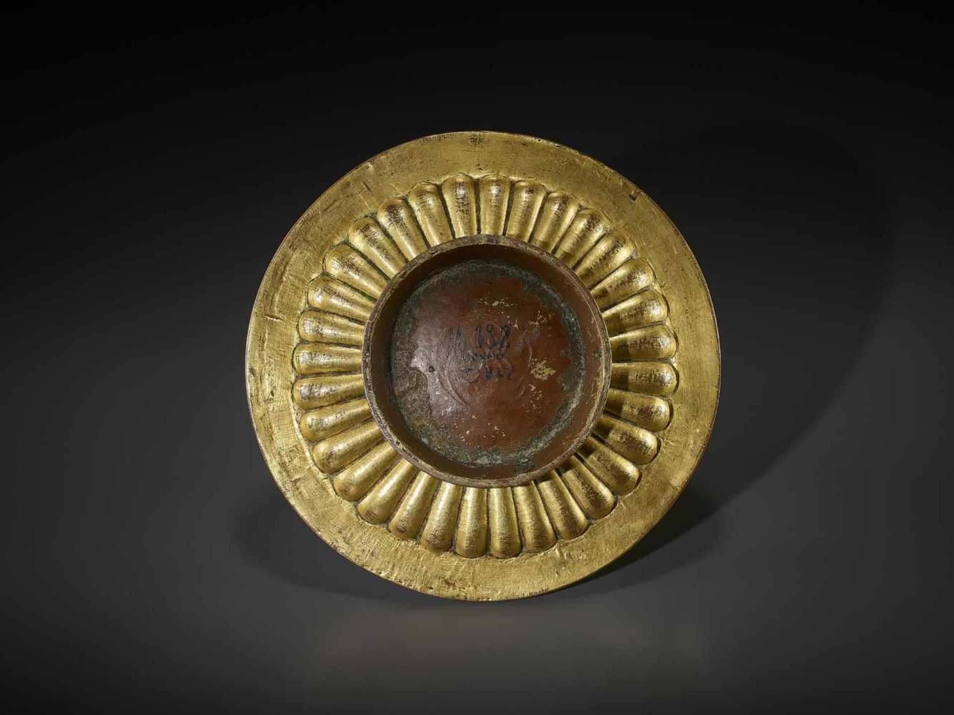 A GILT-BRONZE GANKYIL RITUAL BOWL Tibet, 13th – 14th Century. Finely worked with a central medallion - Image 2 of 8