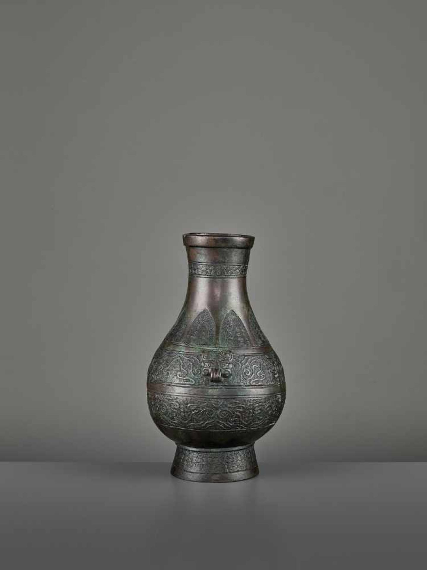 A BRONZE RITUAL VASE, HU China, Ming dynasty (1368-1644) or earlier. The archaistic vessel is cast - Image 4 of 11