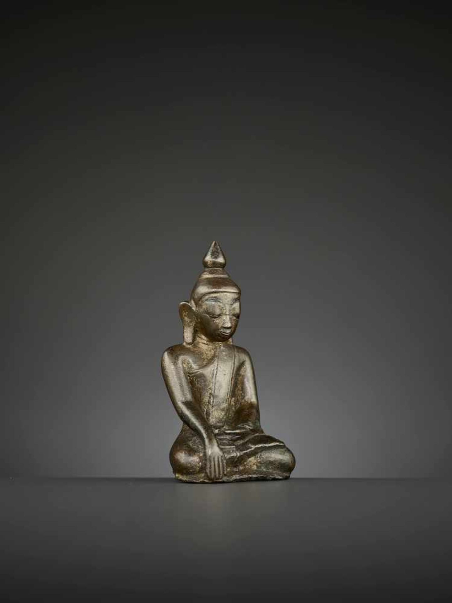 A BUDDHA BRONZE, BURMA, 14TH CENTURY The superbly cast statue depicting Shakyamuni seated in - Image 7 of 8