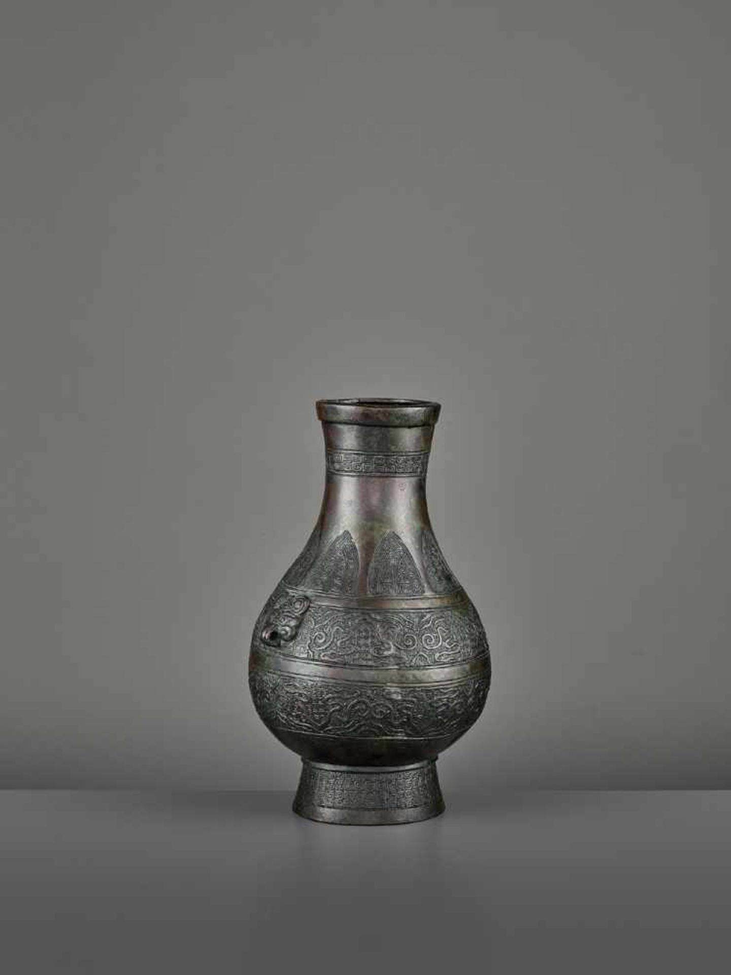 A BRONZE RITUAL VASE, HU China, Ming dynasty (1368-1644) or earlier. The archaistic vessel is cast - Image 5 of 11