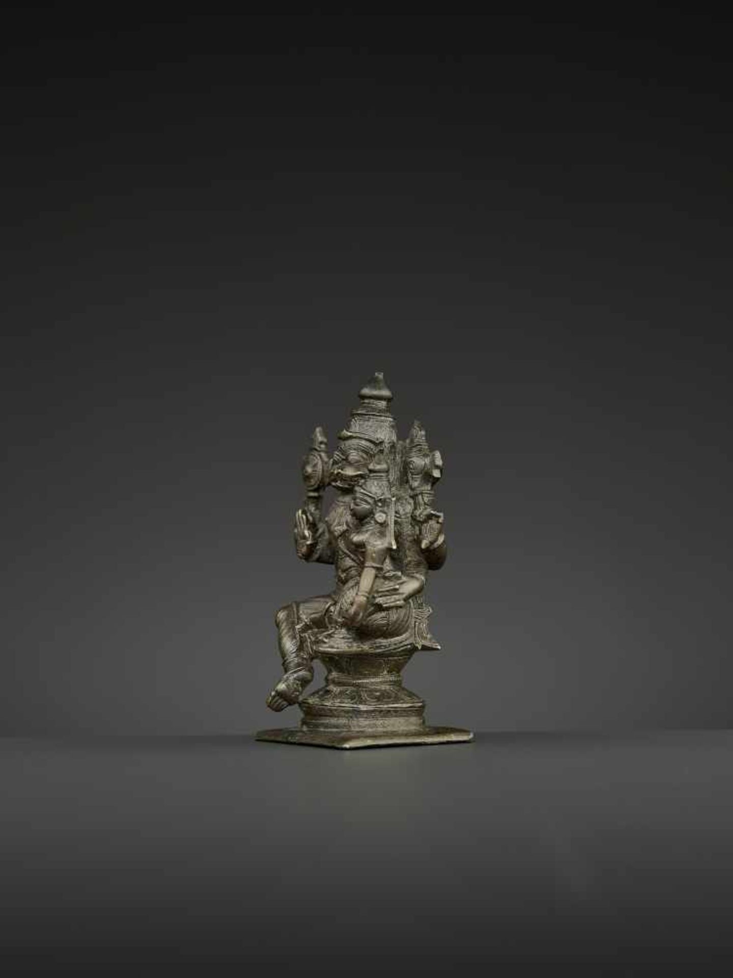 A NARASIMHA LAKSHMI BRONZE South India, Tamil Nadu, 18th – 19th century. The lion deity Narasimha is - Image 3 of 7